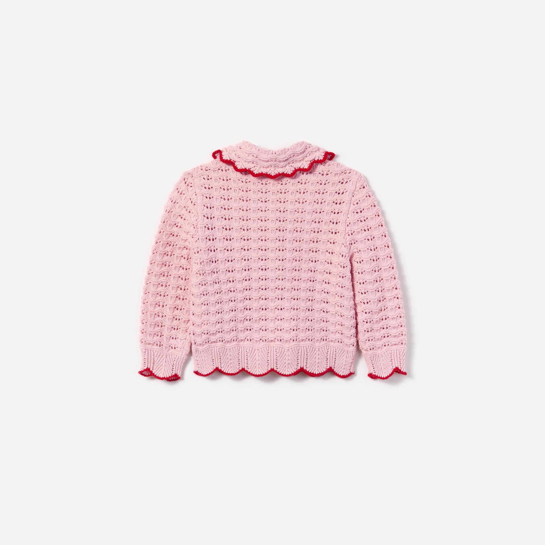 Side view of a woman wearing the Pink Textured Heart Detail Cardigan