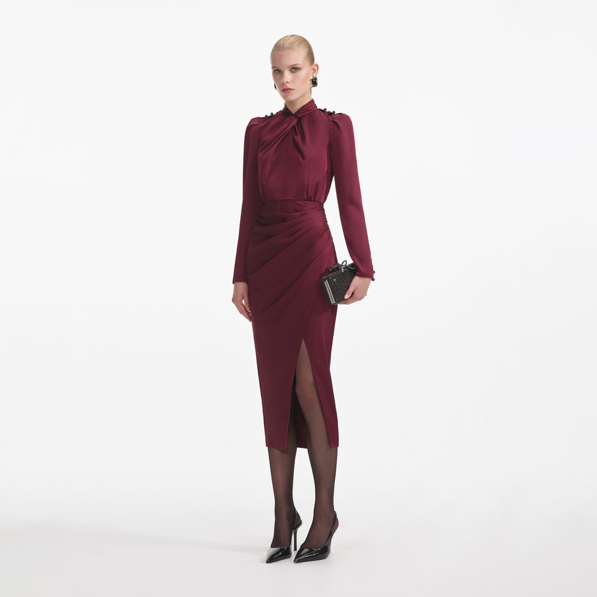 Side view of a woman wearing the Burgundy Satin Midi Dress