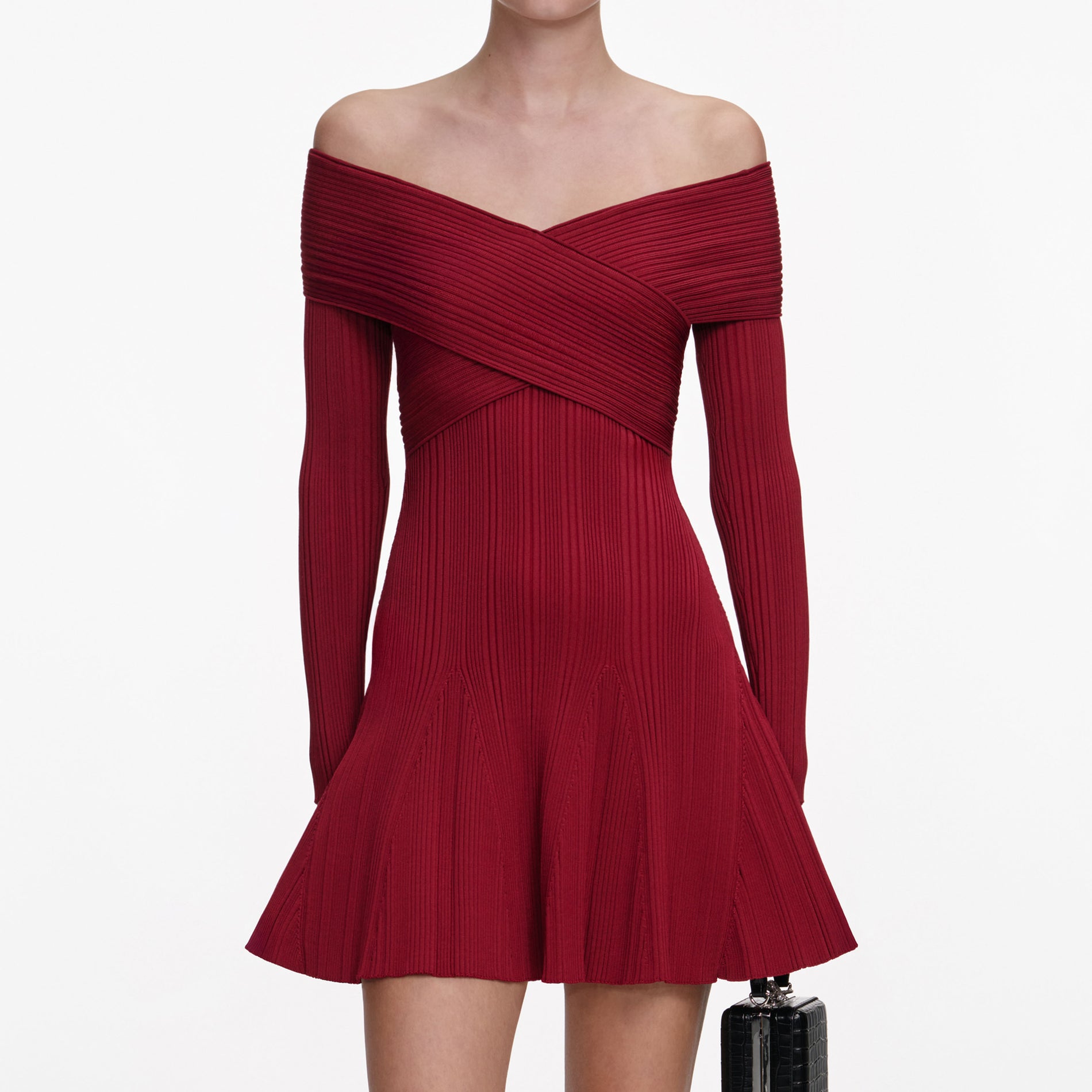 A close up of a woman wearing the Burgundy Viscose Knit Mini Dress