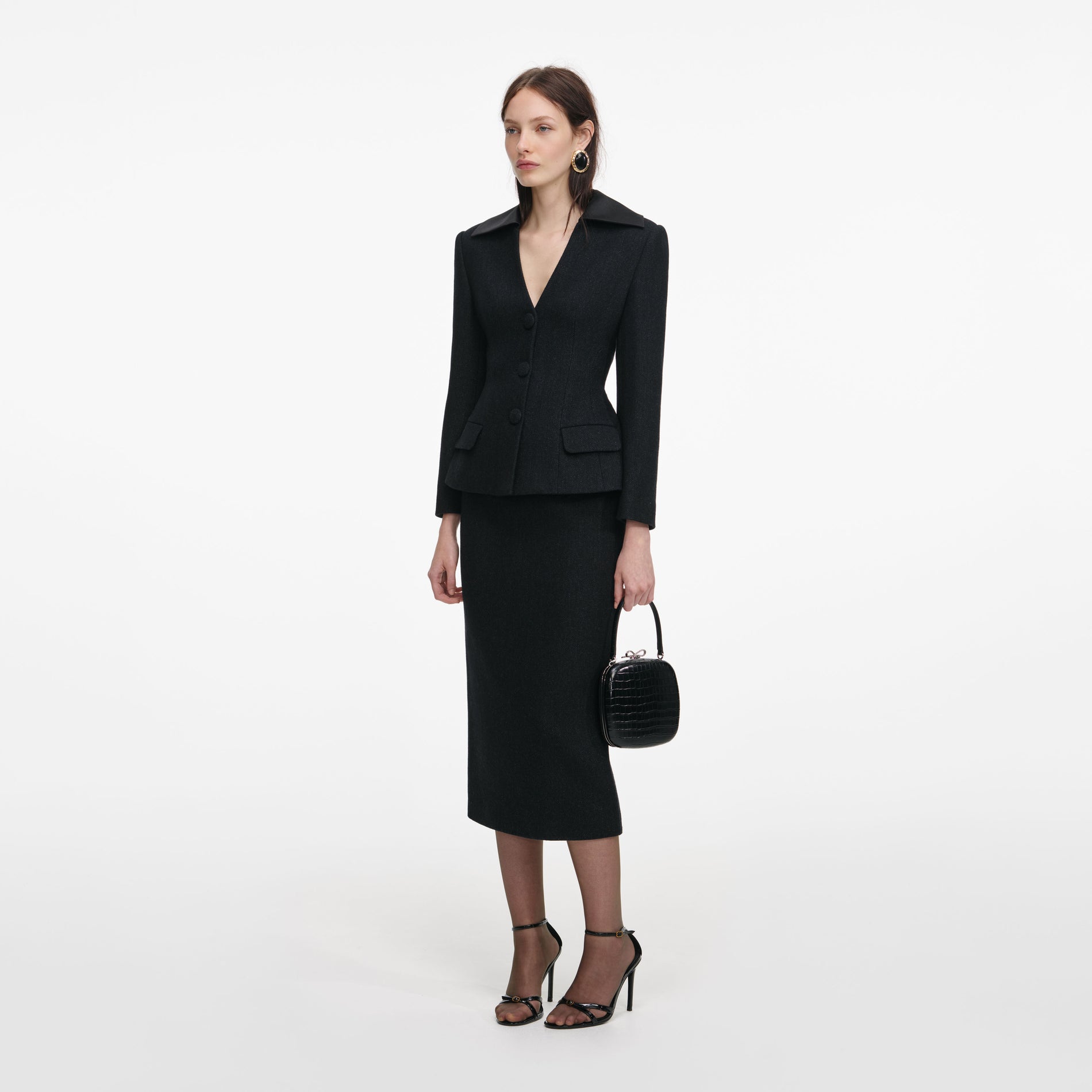 Side view of a woman wearing the Black Blazer Tailored Midi Dress