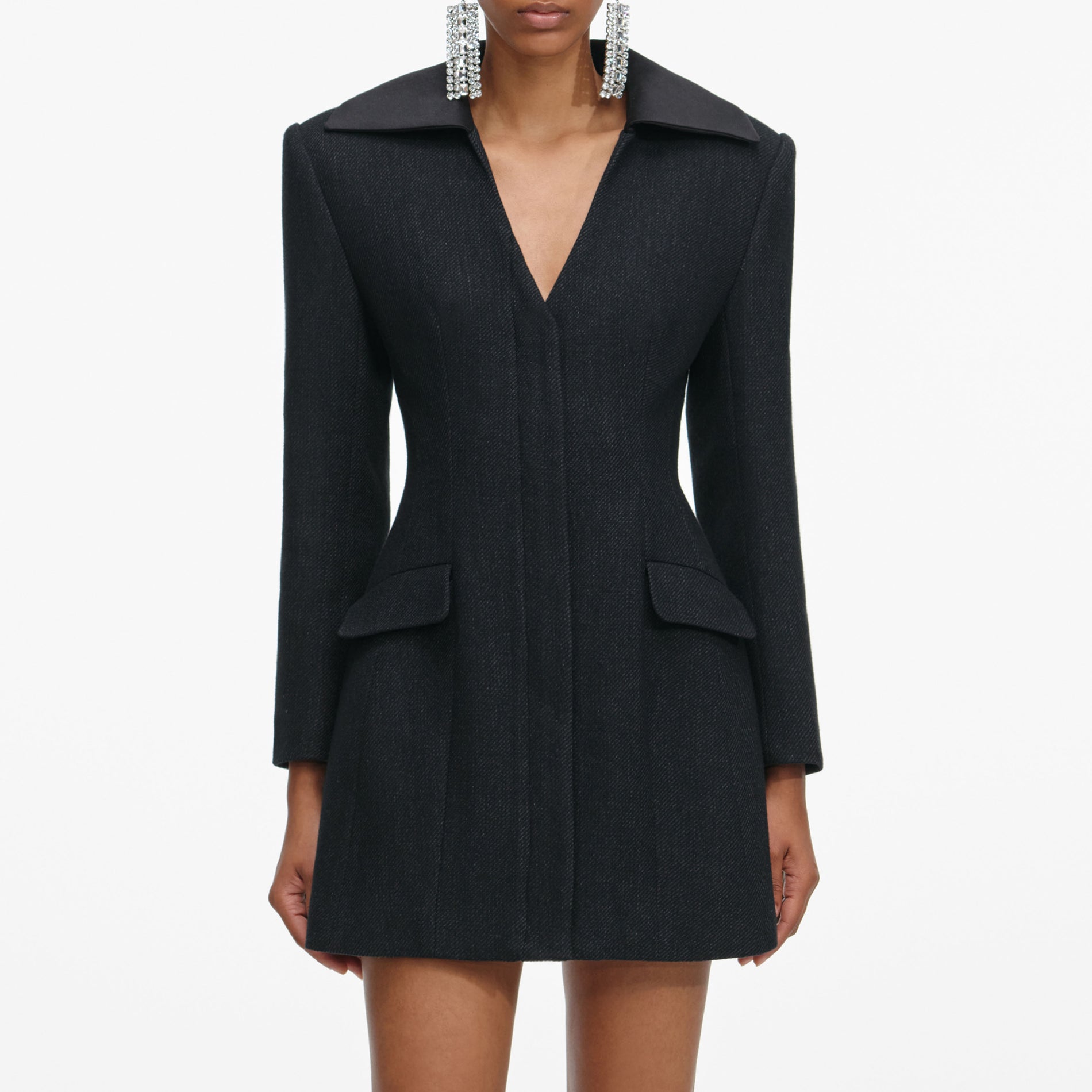 A close up of a woman wearing the Black Blazer Mini Dress