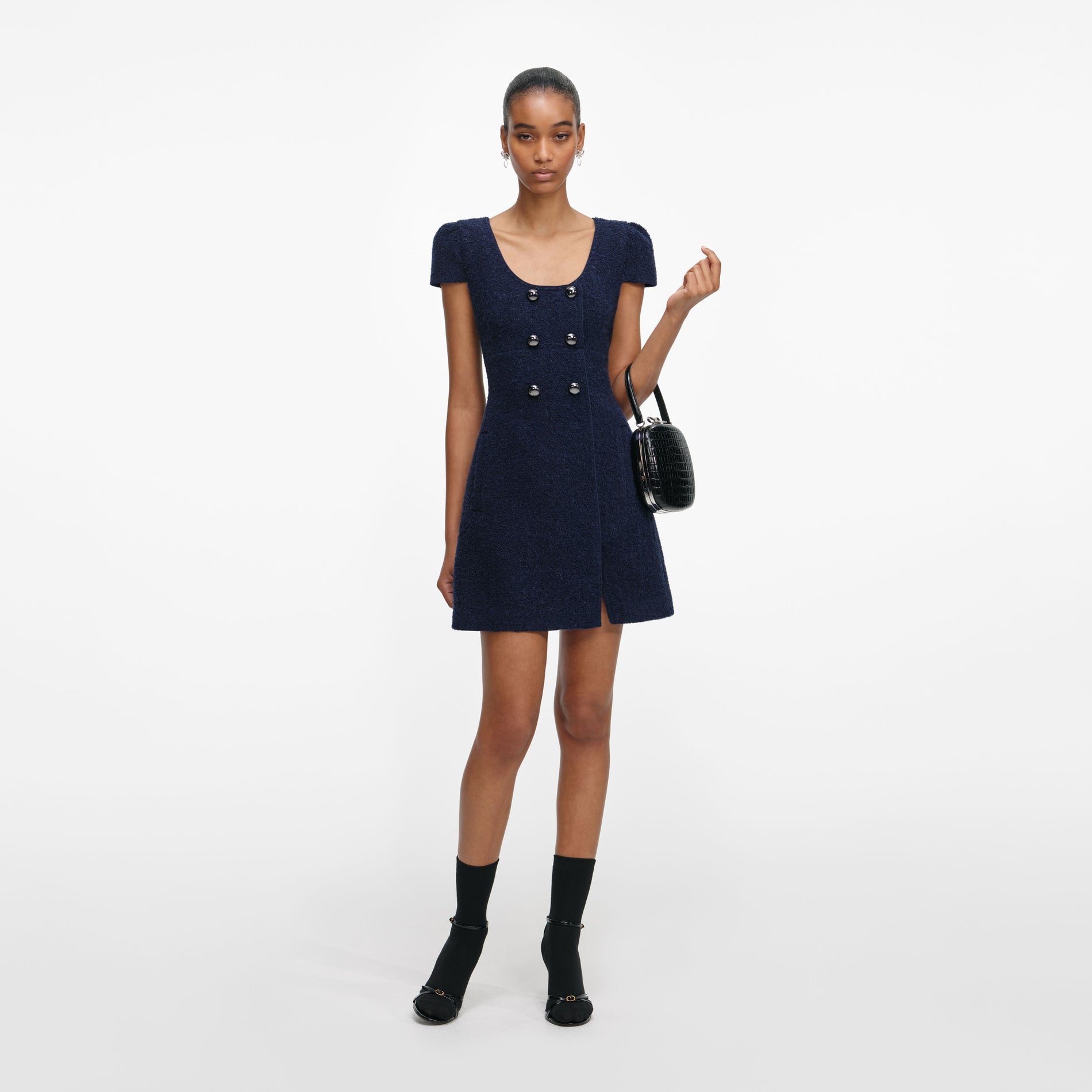 Front view of a woman wearing the Navy Textured Boucle Mini Dress