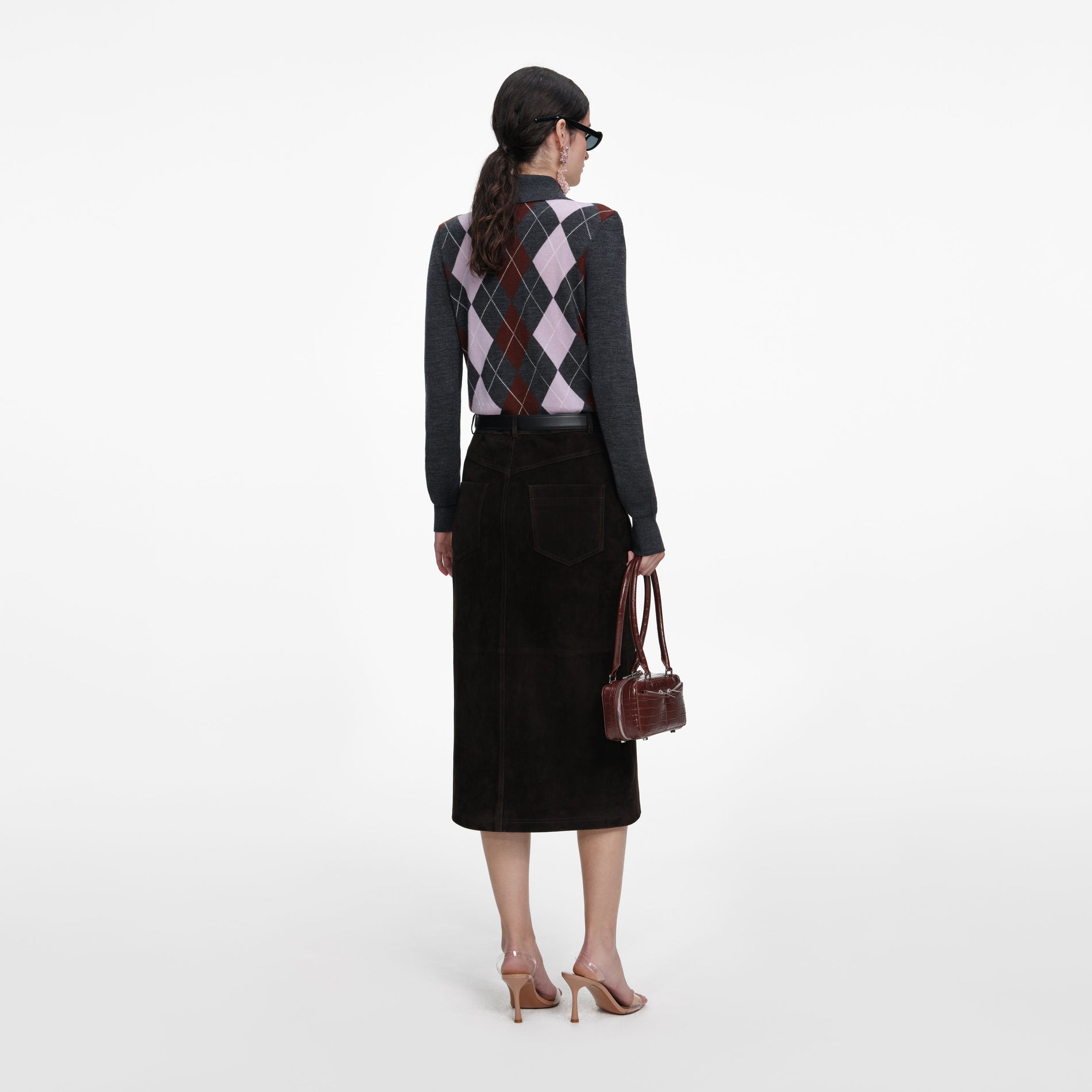 Back view of a woman wearing the Grey Argyle Lightweight Jumper