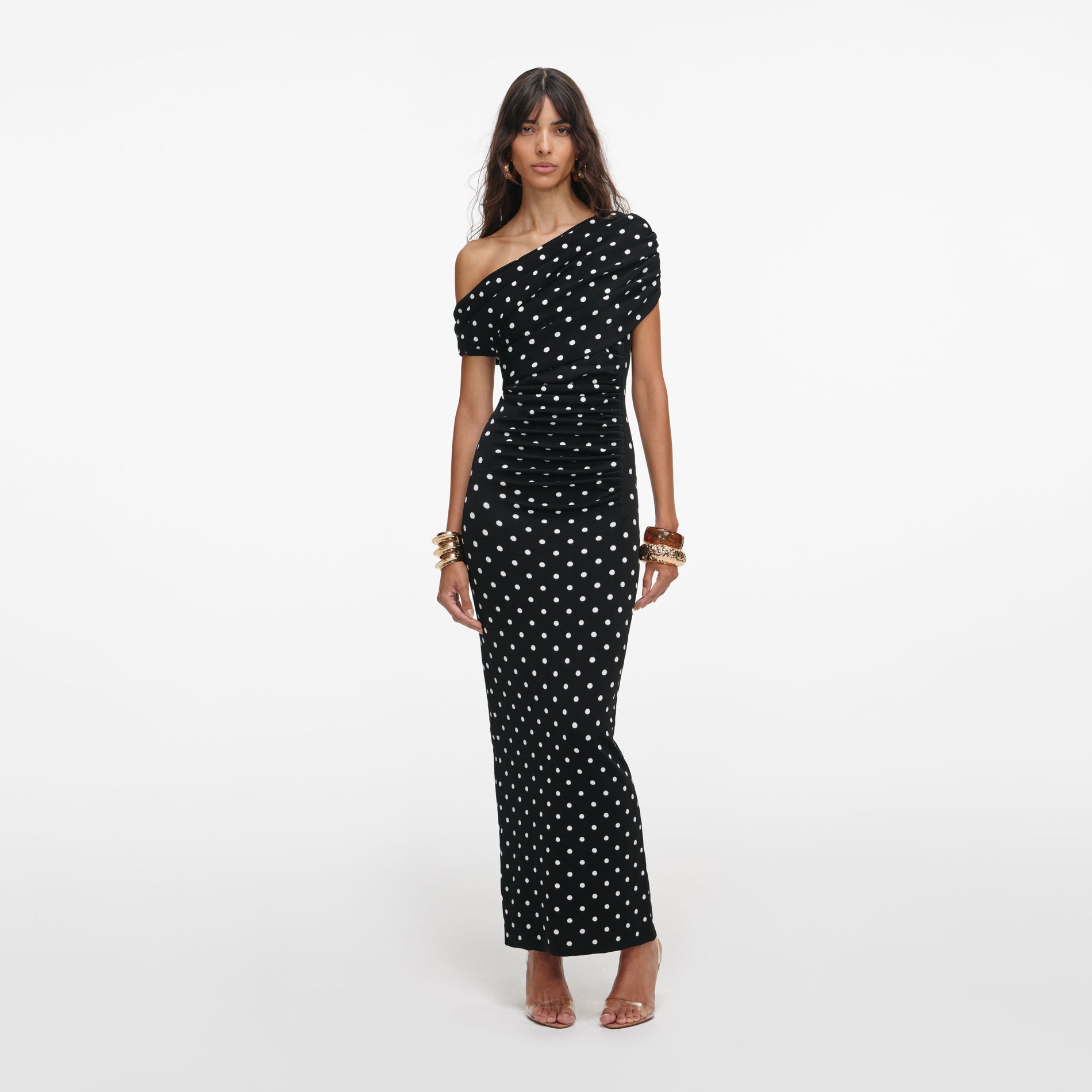 Front view of a woman wearing the Polka Dot Draped Knit Midi Dress
