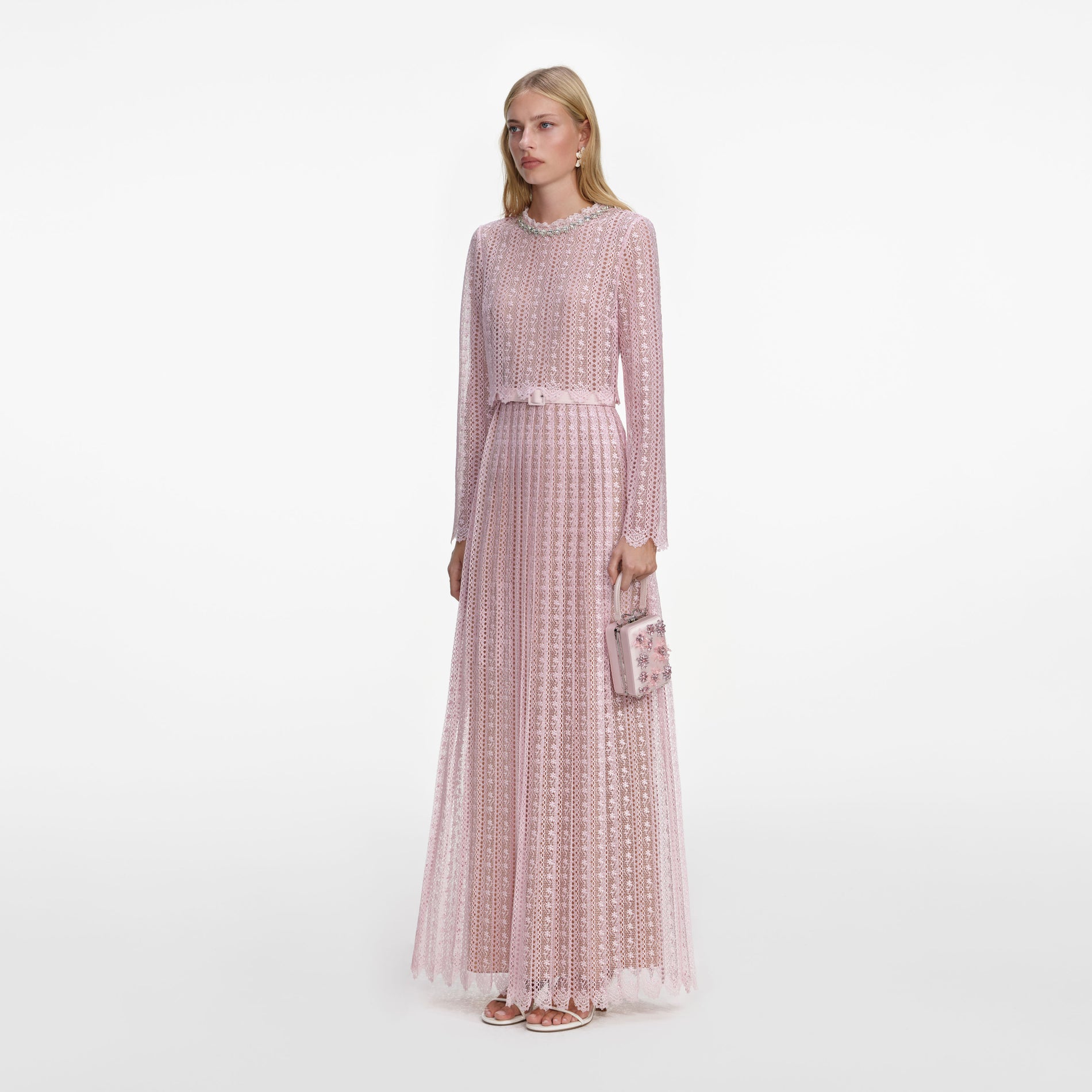 Side view of a woman wearing the Pink Organza Lace Maxi Dress
