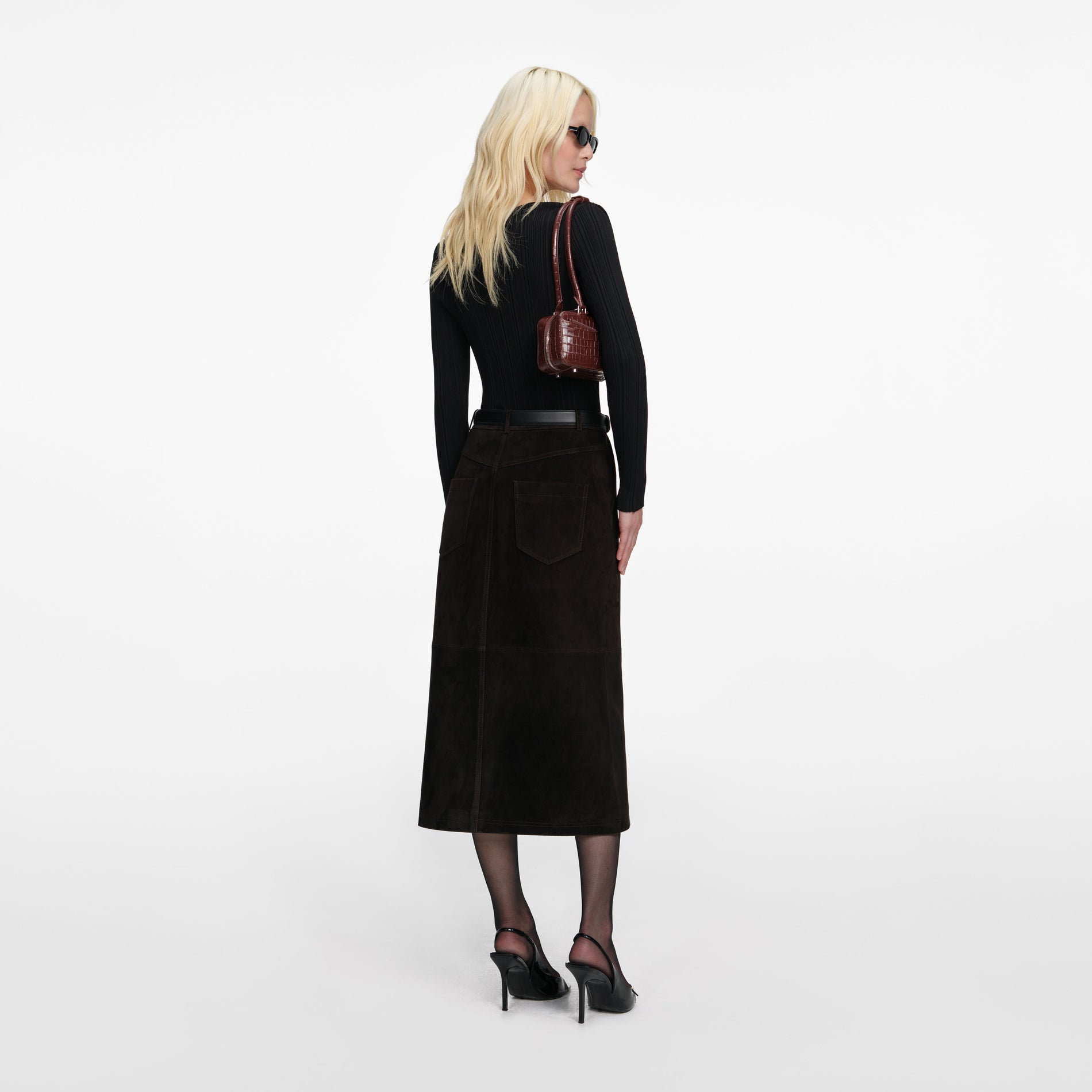 Back view of a woman wearing the Black Lace Knit Top