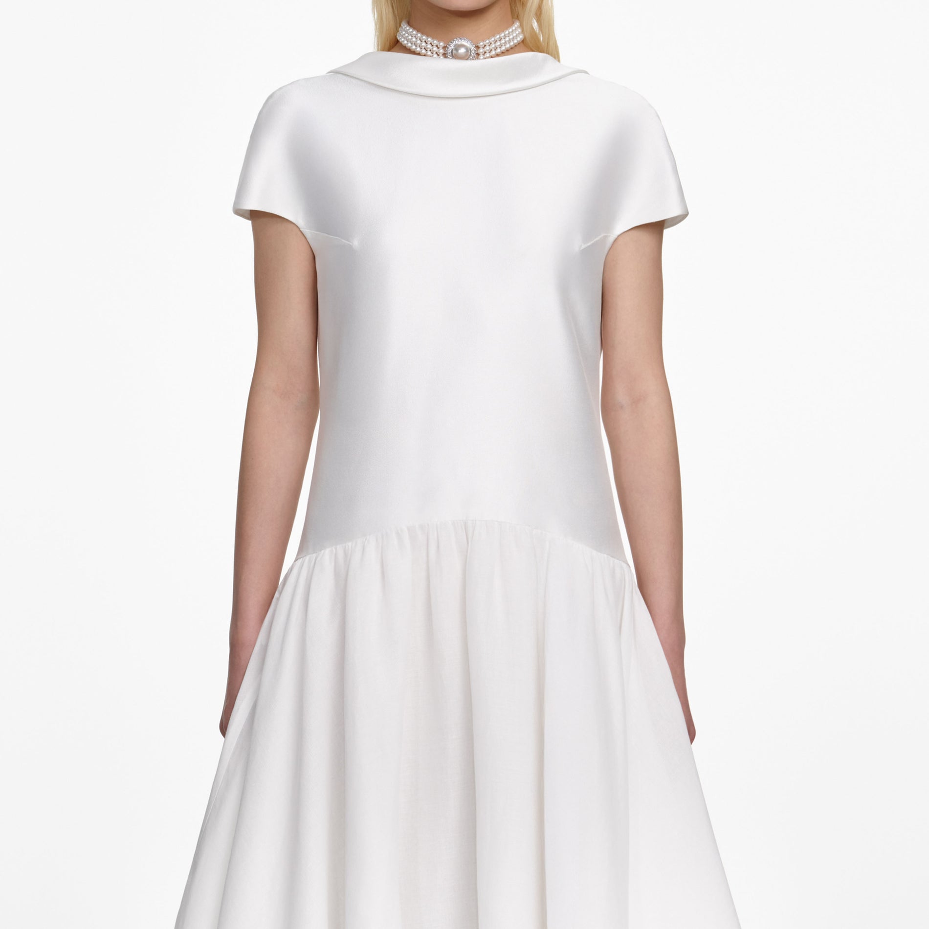 A close up of a woman wearing the White Satin Ramie Midi Dress