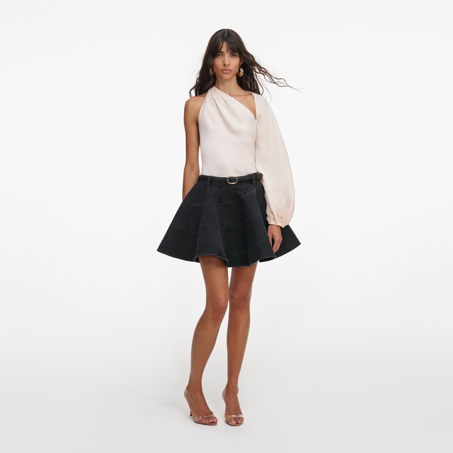 Front view of a woman wearing the Cream Draped Sleeve Top