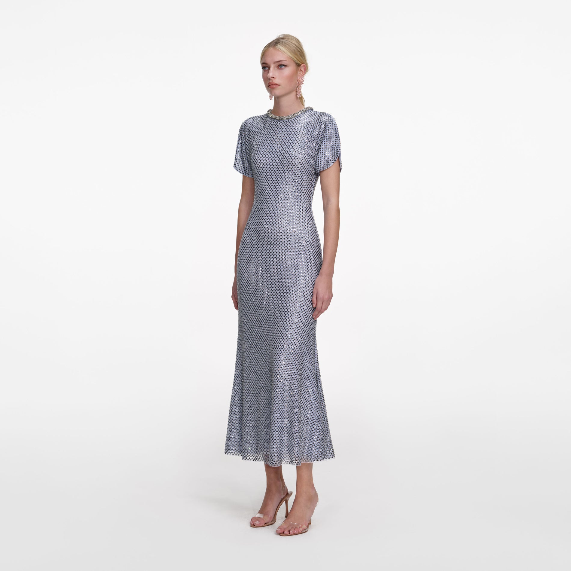 Side view of a woman wearing the Blue Rhinestone Mesh Midi Dress