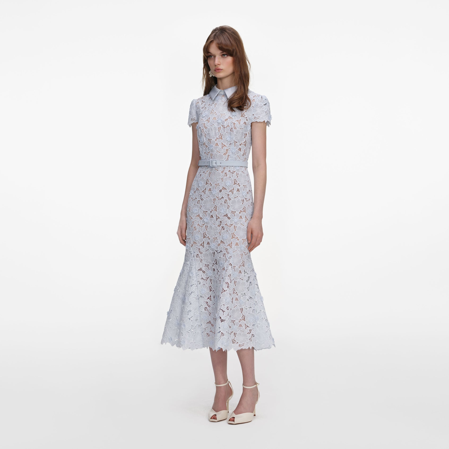 Side view of a woman wearing the Blue Guipure Lace Midi Dress