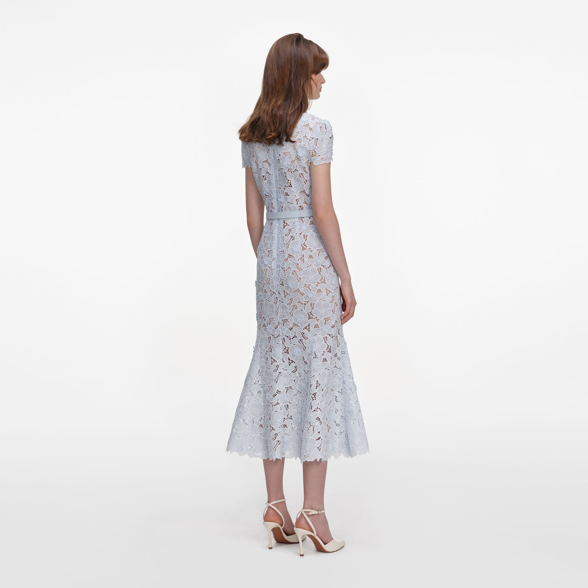 Back view of a woman wearing the Blue Guipure Lace Midi Dress