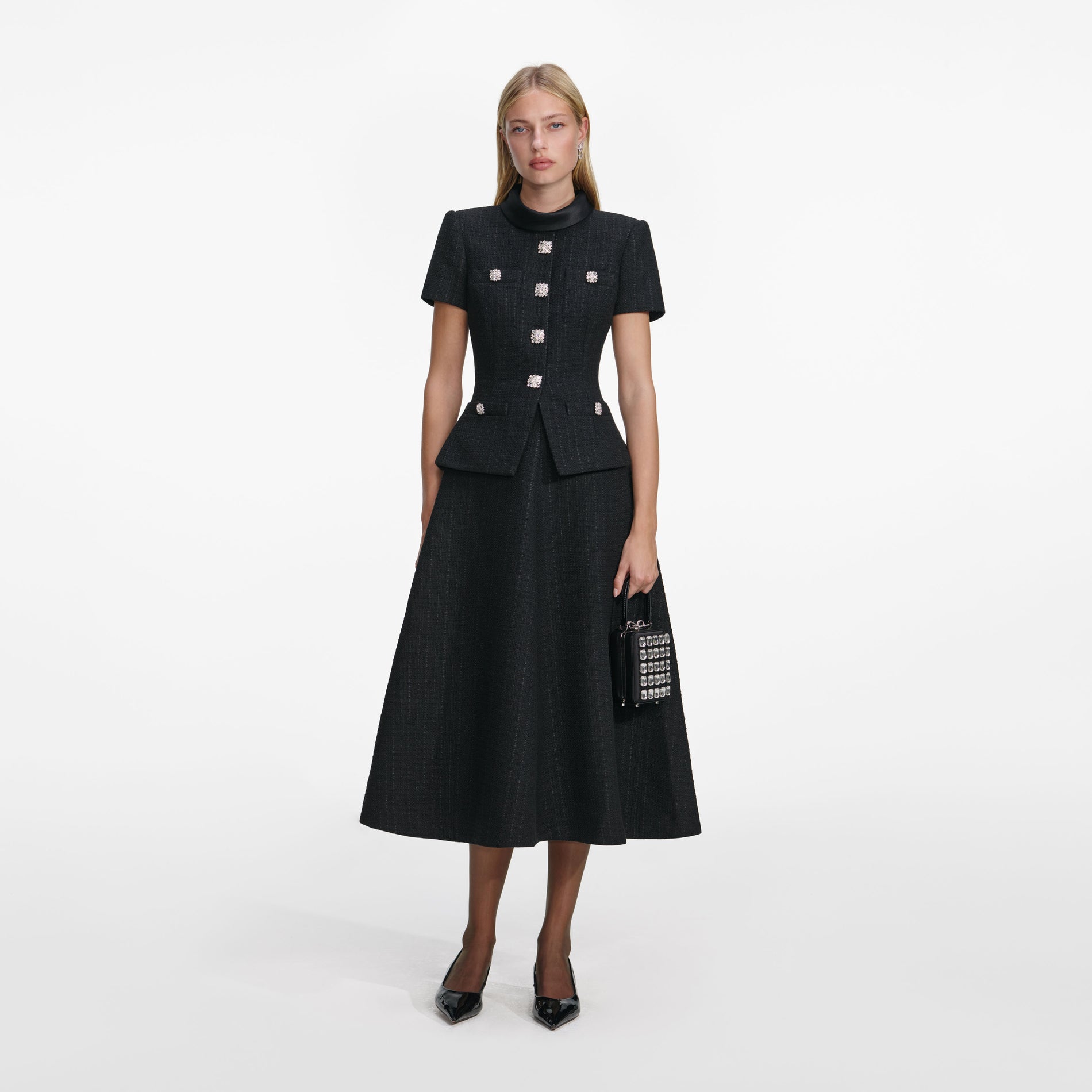 Front view of a woman wearing the Black Boucle Collared Midi Dress