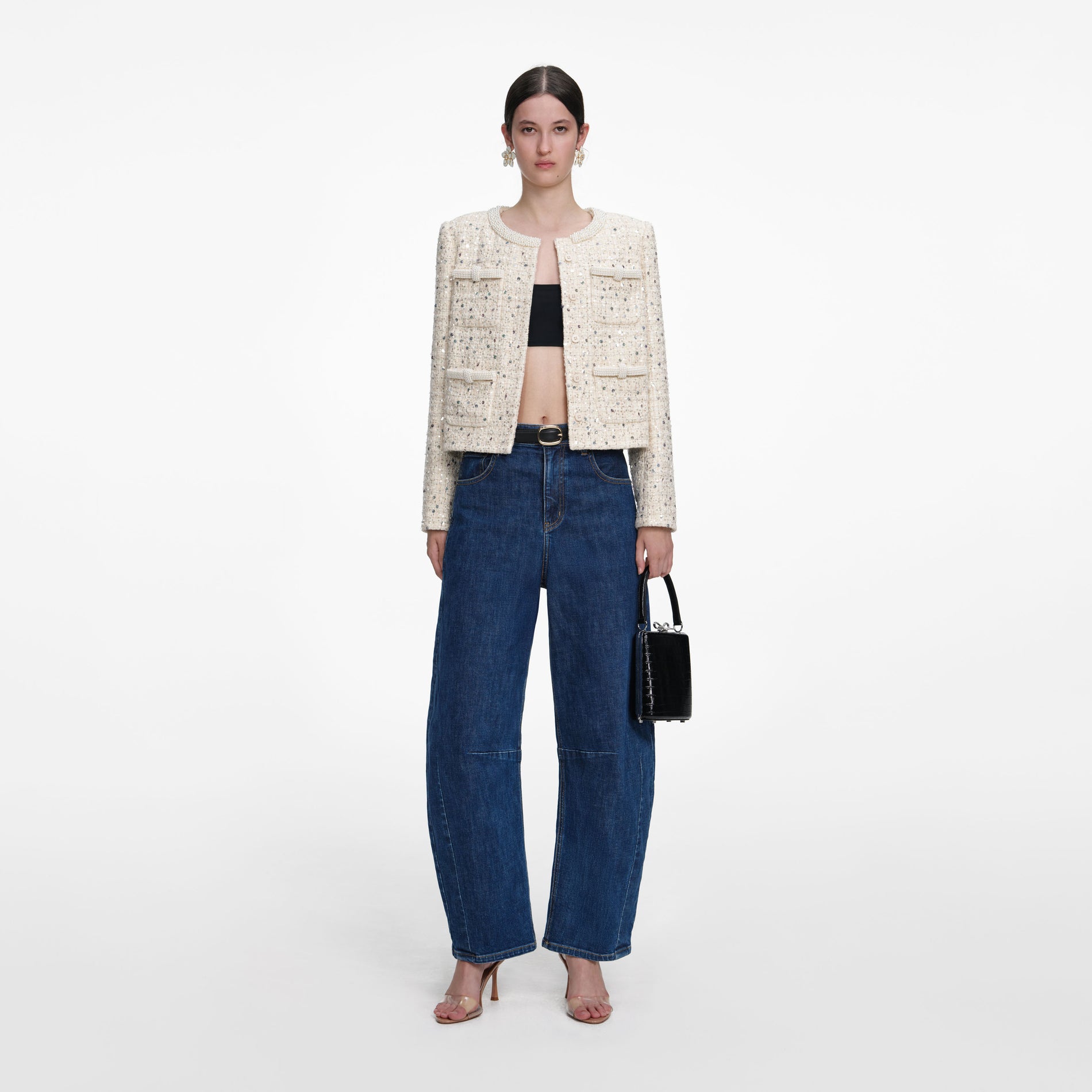 Front view of a woman wearing the Cream Embellished Boucle Jacket
