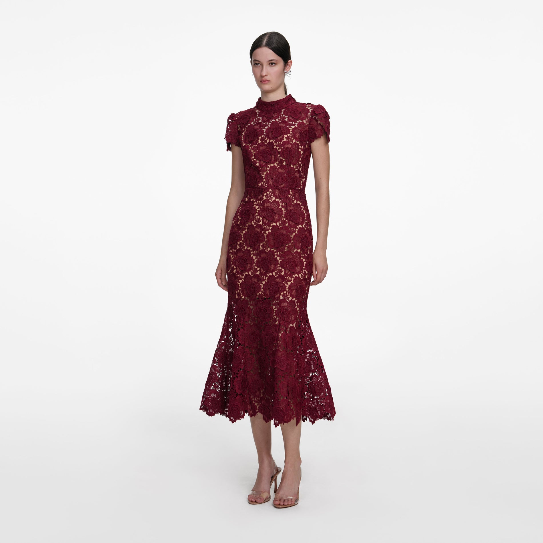 Side view of a woman wearing the Burgundy Flower Lace Midi Dress