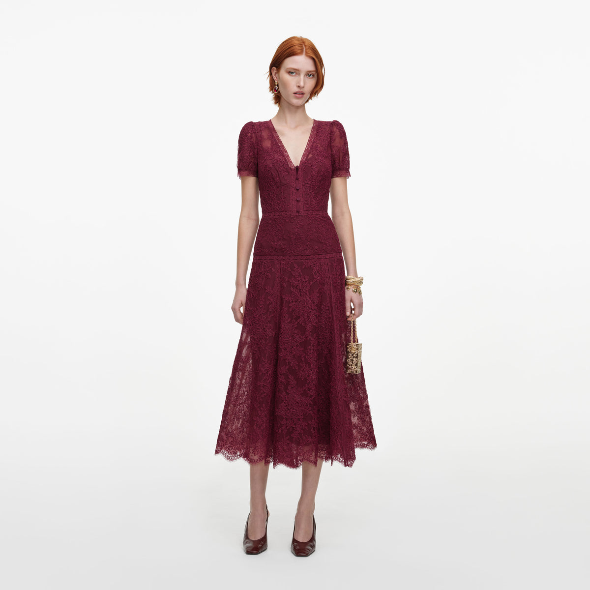 Front view of a woman wearing the Burgundy Lace Midi Dress