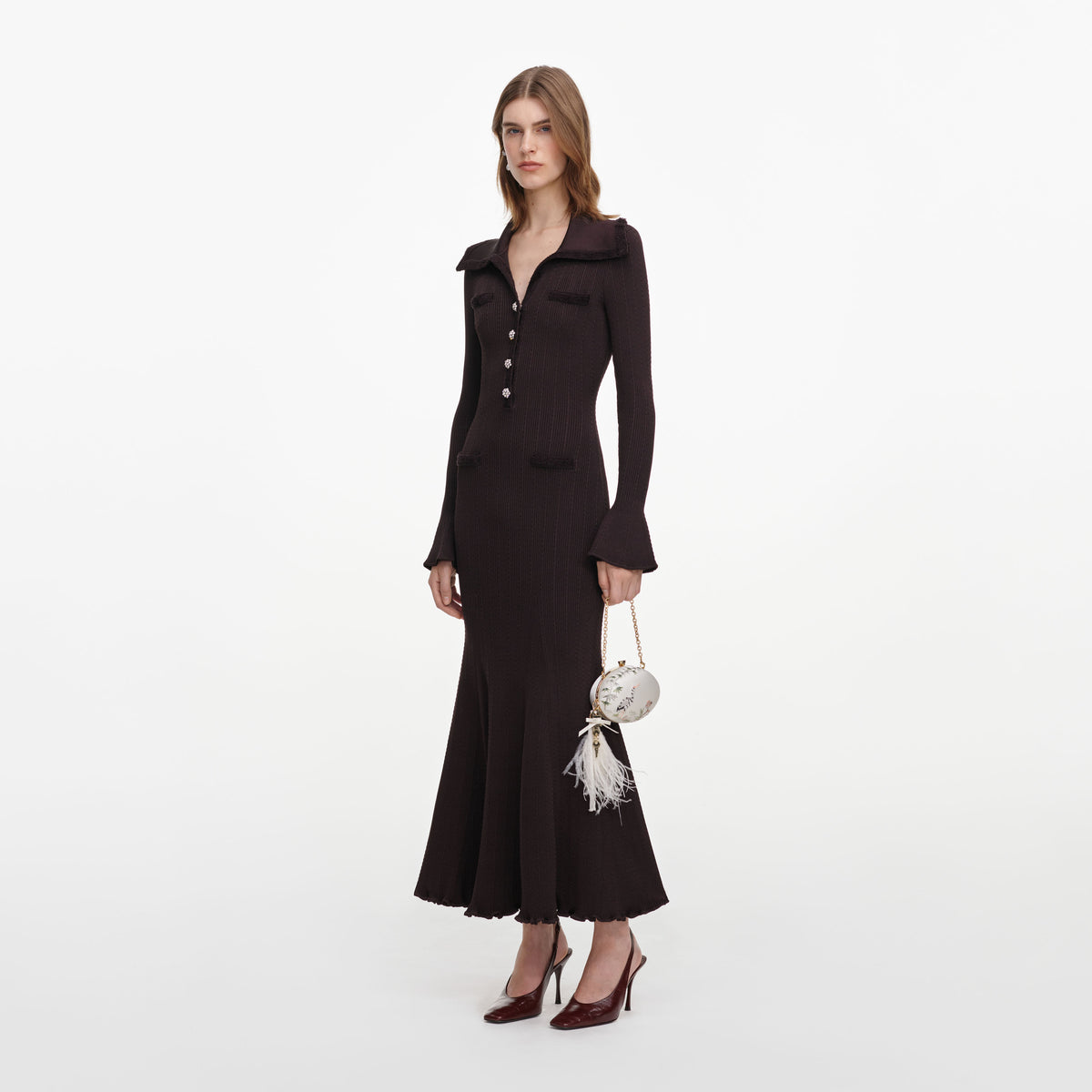 Side view of a woman wearing the Brown Fringe Knit Midi Dress