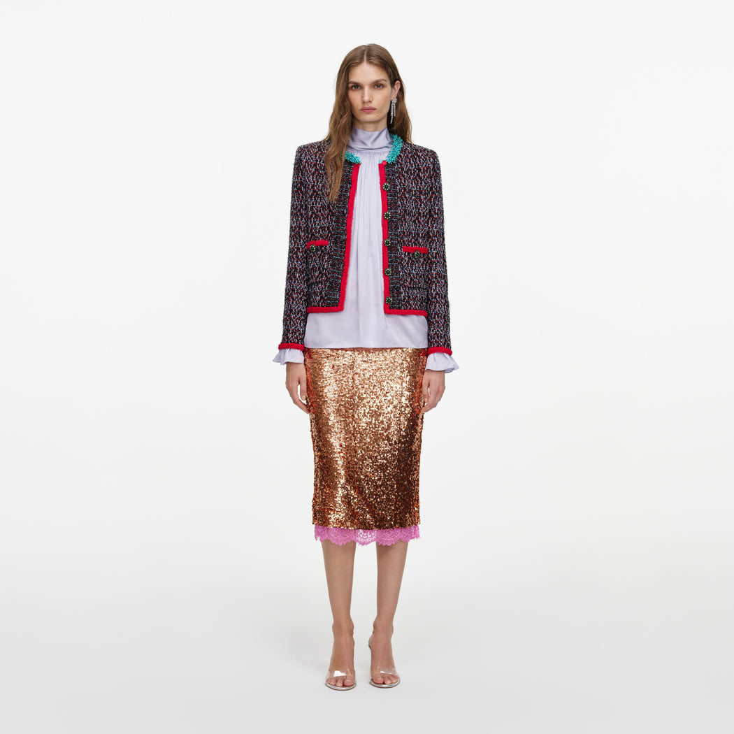 Front view of a woman wearing the Multi Textured Knit Cardigan