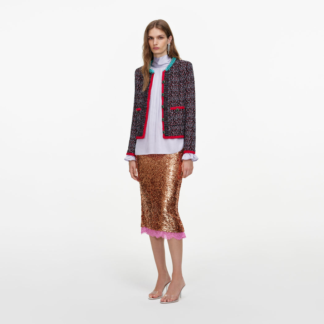 Side view of a woman wearing the Multi Textured Knit Cardigan