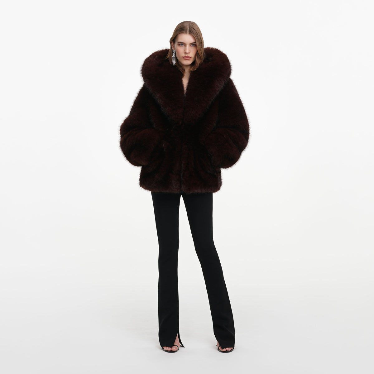 Front view of a woman wearing the Brown Faux Fur Hooded Jacket