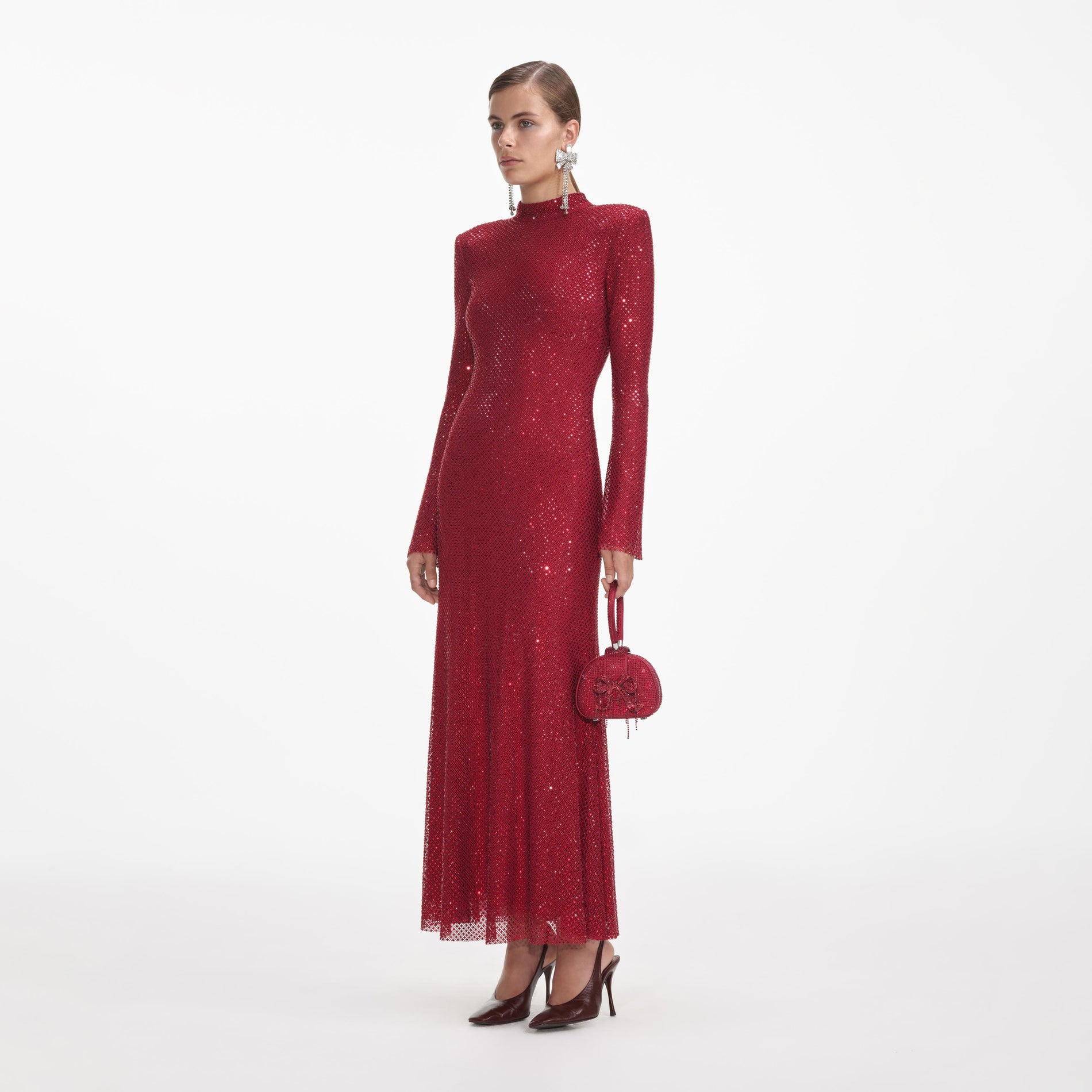 Side view of a woman wearing the Red Rhinestone Fishnet Midi Dress