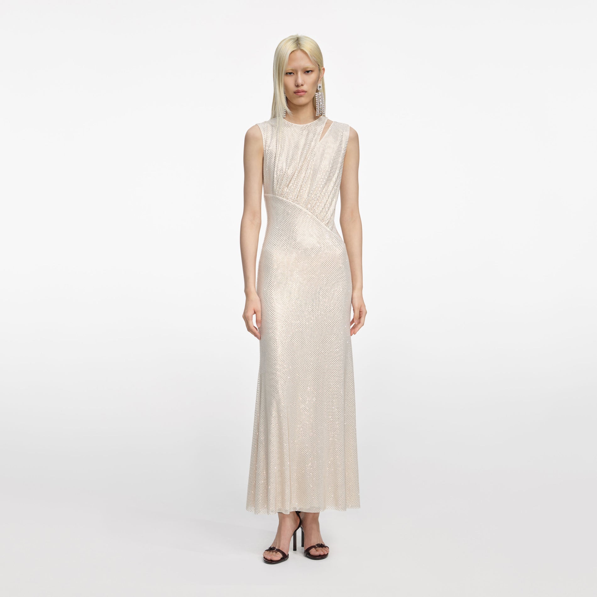 Front view of a woman wearing the Champagne Rhinestone Cut Out Midi Dress