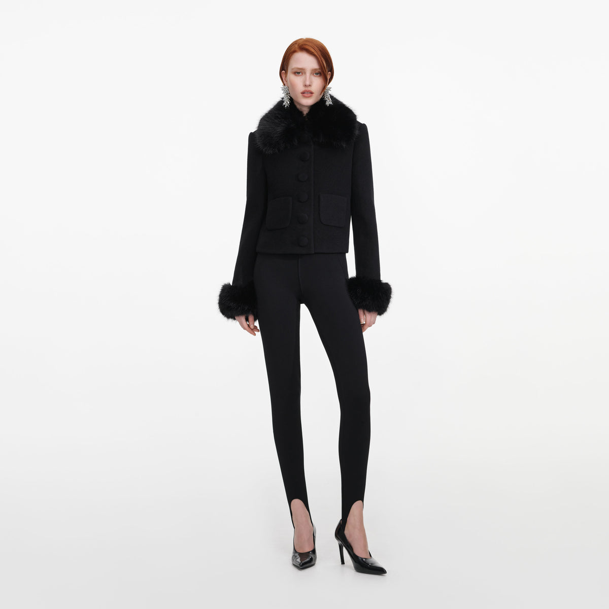 Front view of a woman wearing the Black Wool Fur Cuff Jacket