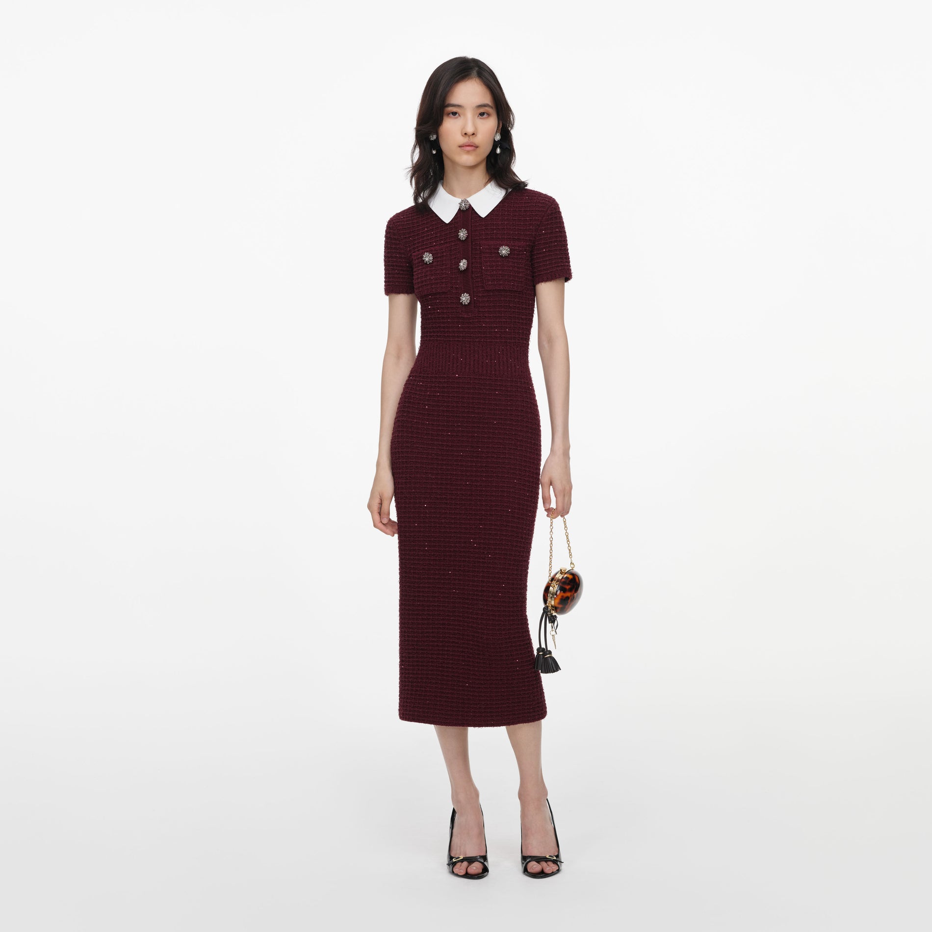 Front view of a woman wearing the Burgundy Textured Knit Midi Dress