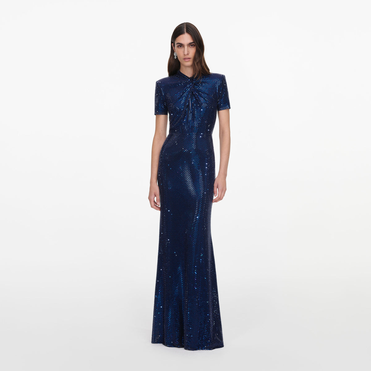 Front view of a woman wearing the Navy Rhinestone Mesh Twist Maxi Dress