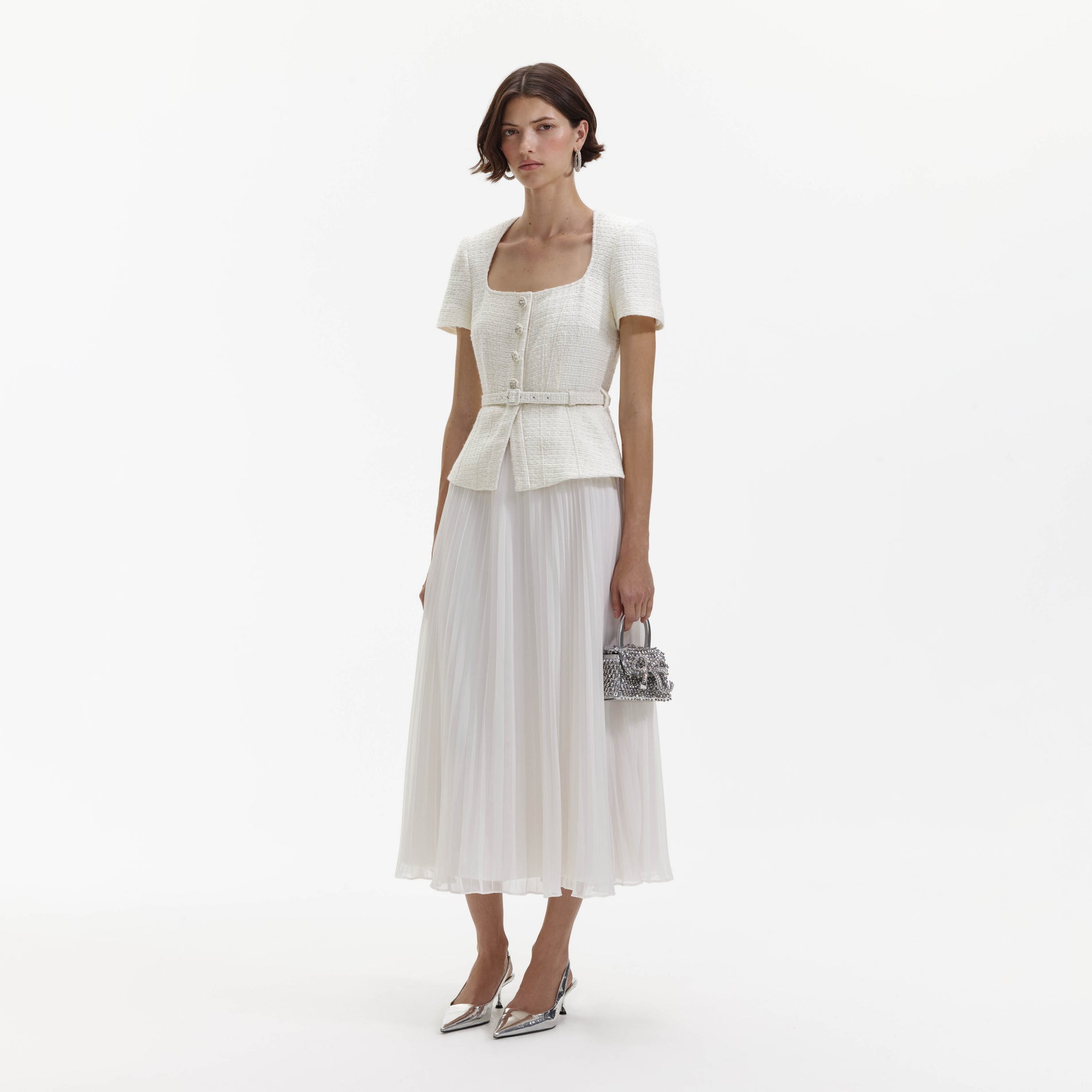 Side view of a woman wearing the Cream Boucle Chiffon Midi Dress