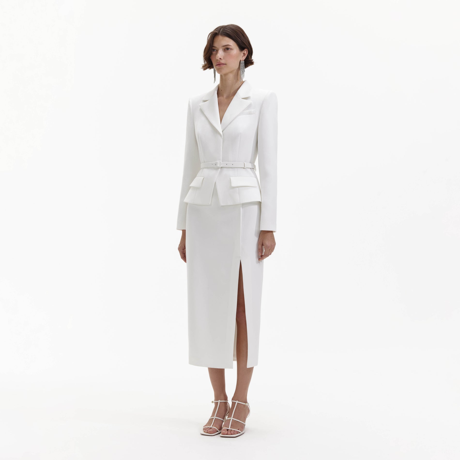 Side view of a woman wearing the White Crepe Tailored Midi Dress
