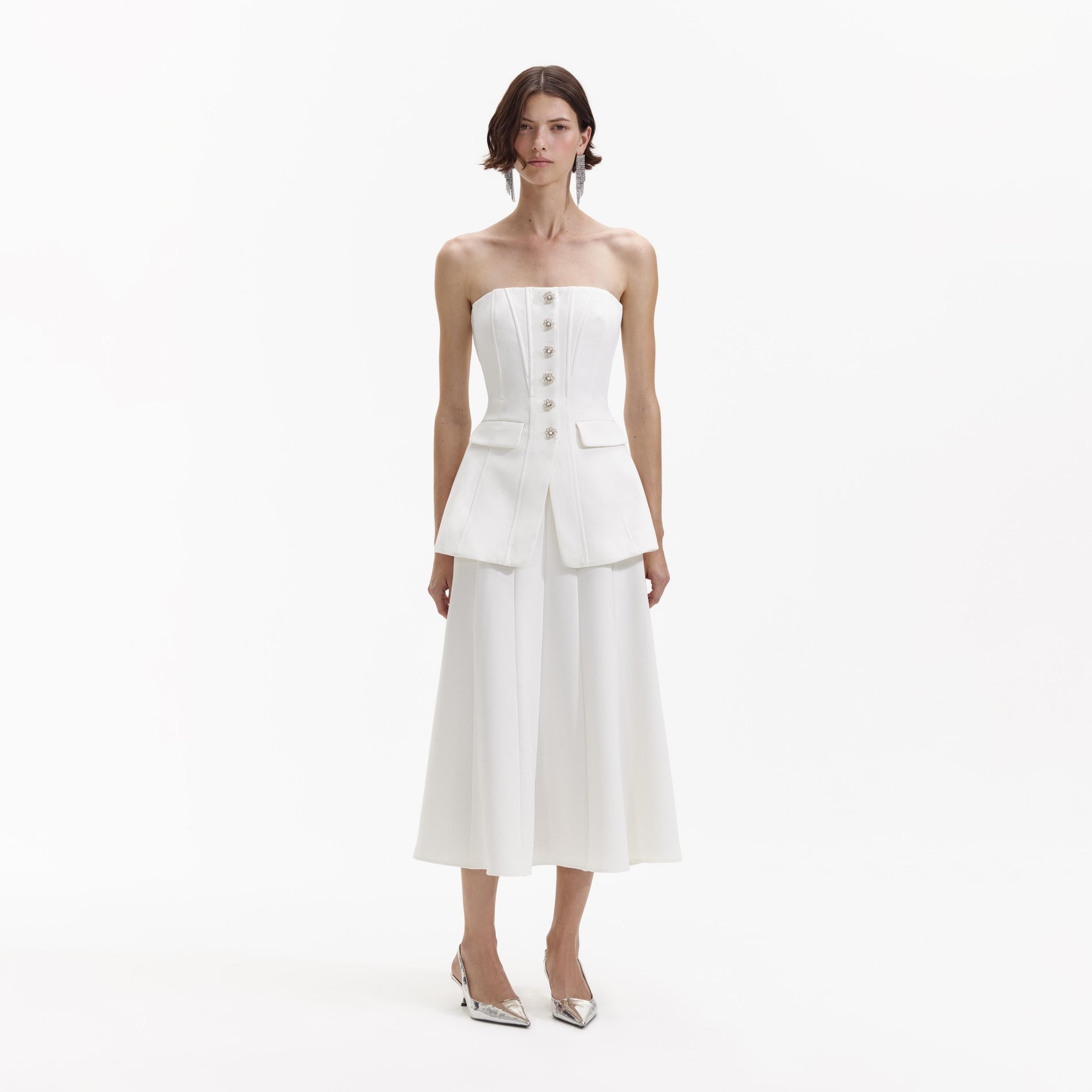 A Woman wearing the White Bandeau Crepe Midi Dress