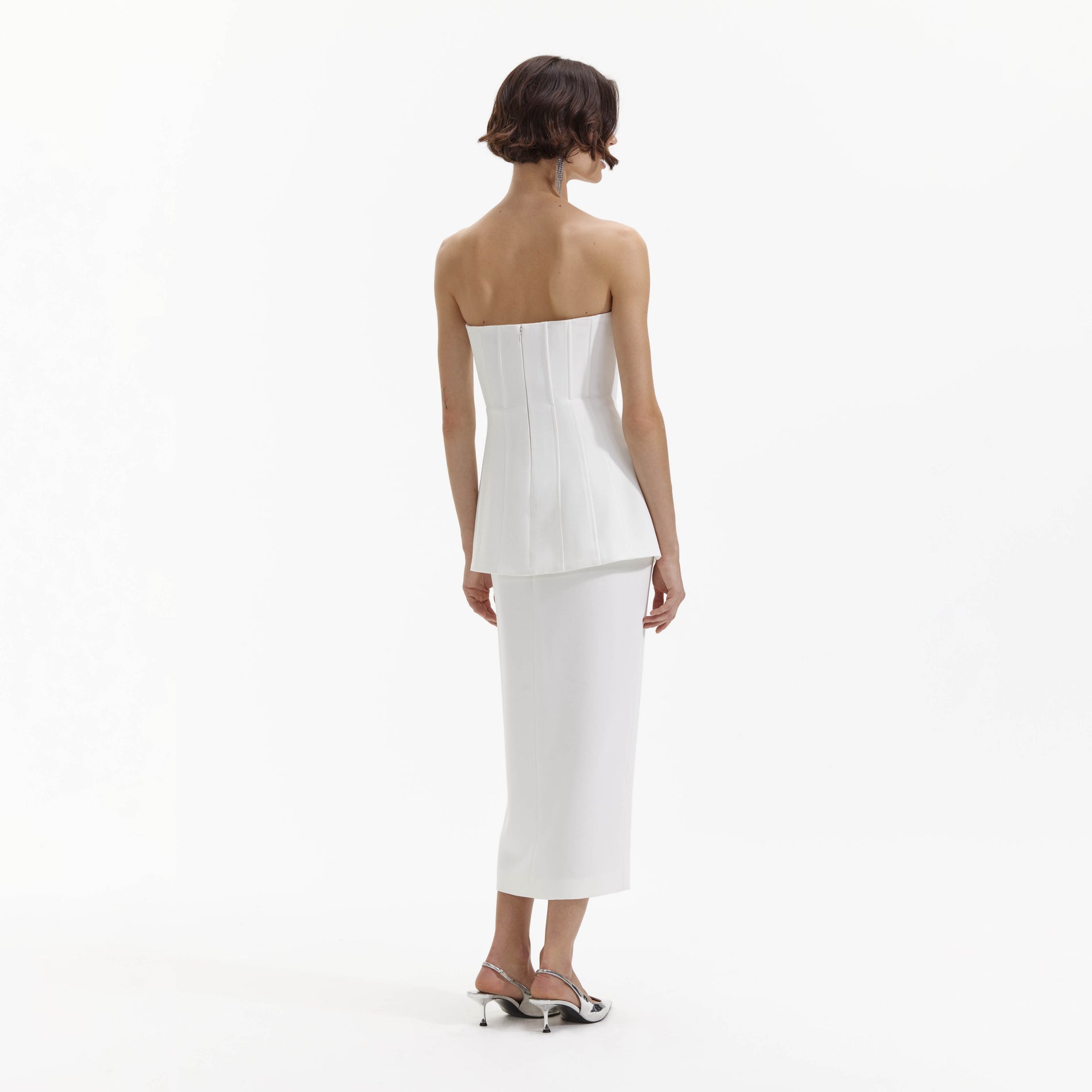 A Woman wearing the White Bandeau Crepe Tailored Midi Dress