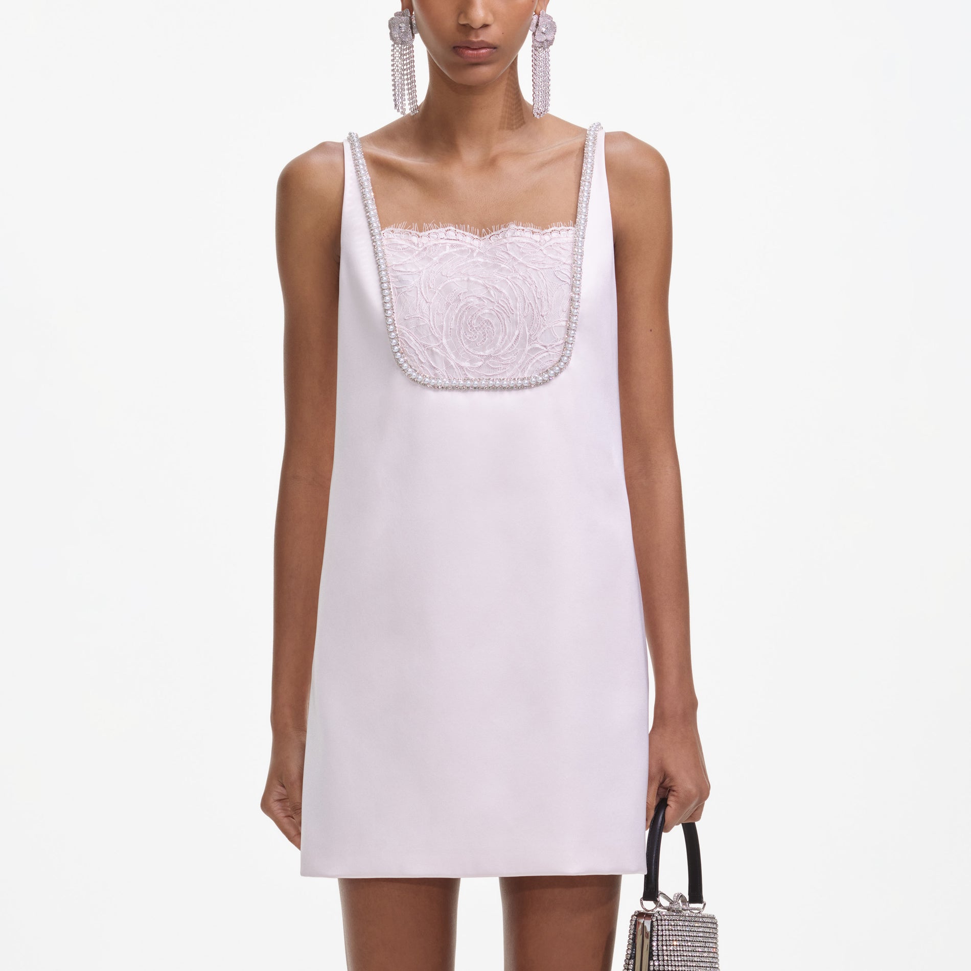 A close up of a woman wearing the Pink Satin Mini Dress