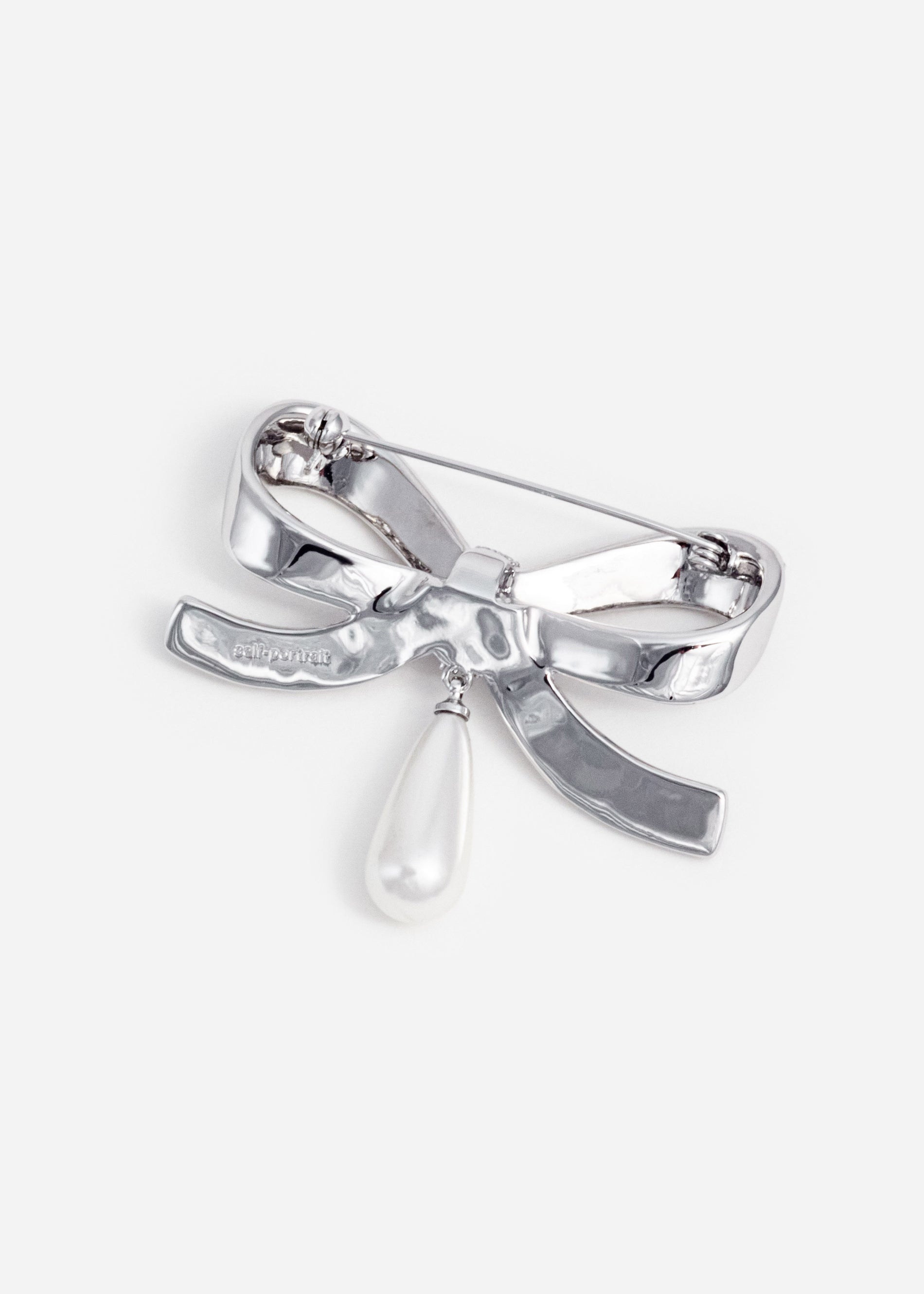 A photo of the Crystal Bow Pearl Droplet Brooch