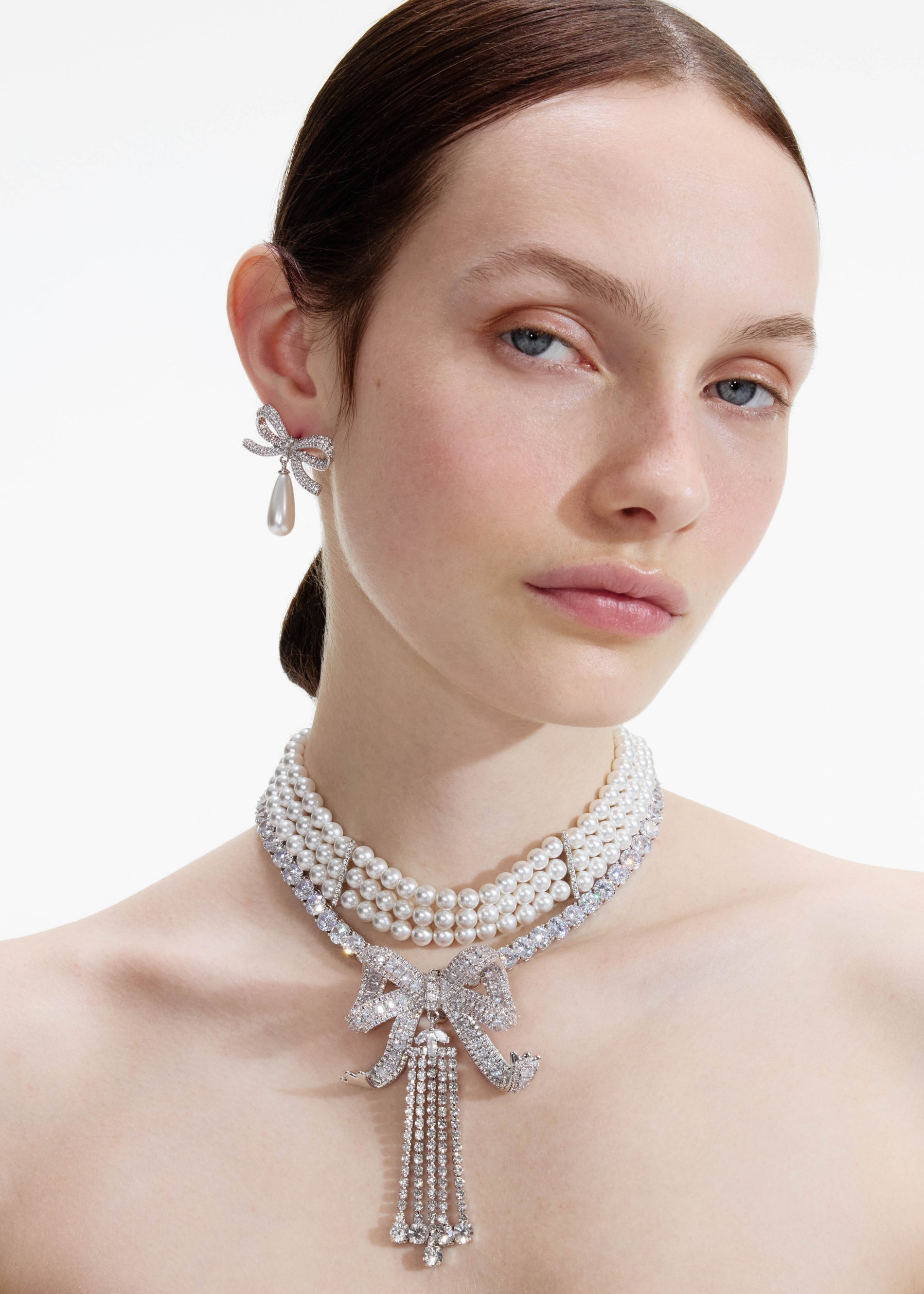 A photo of the Crystal Bow Droplet Pearl Necklace