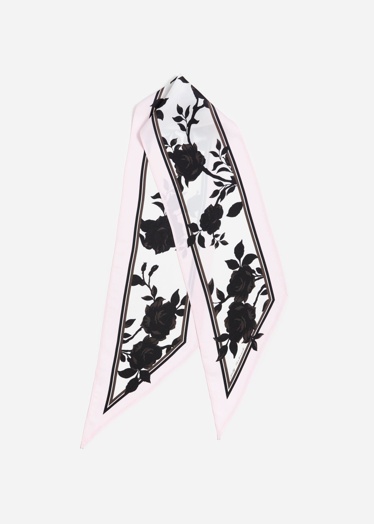 Side view of a woman wearing the Floral Print Twill Scarf