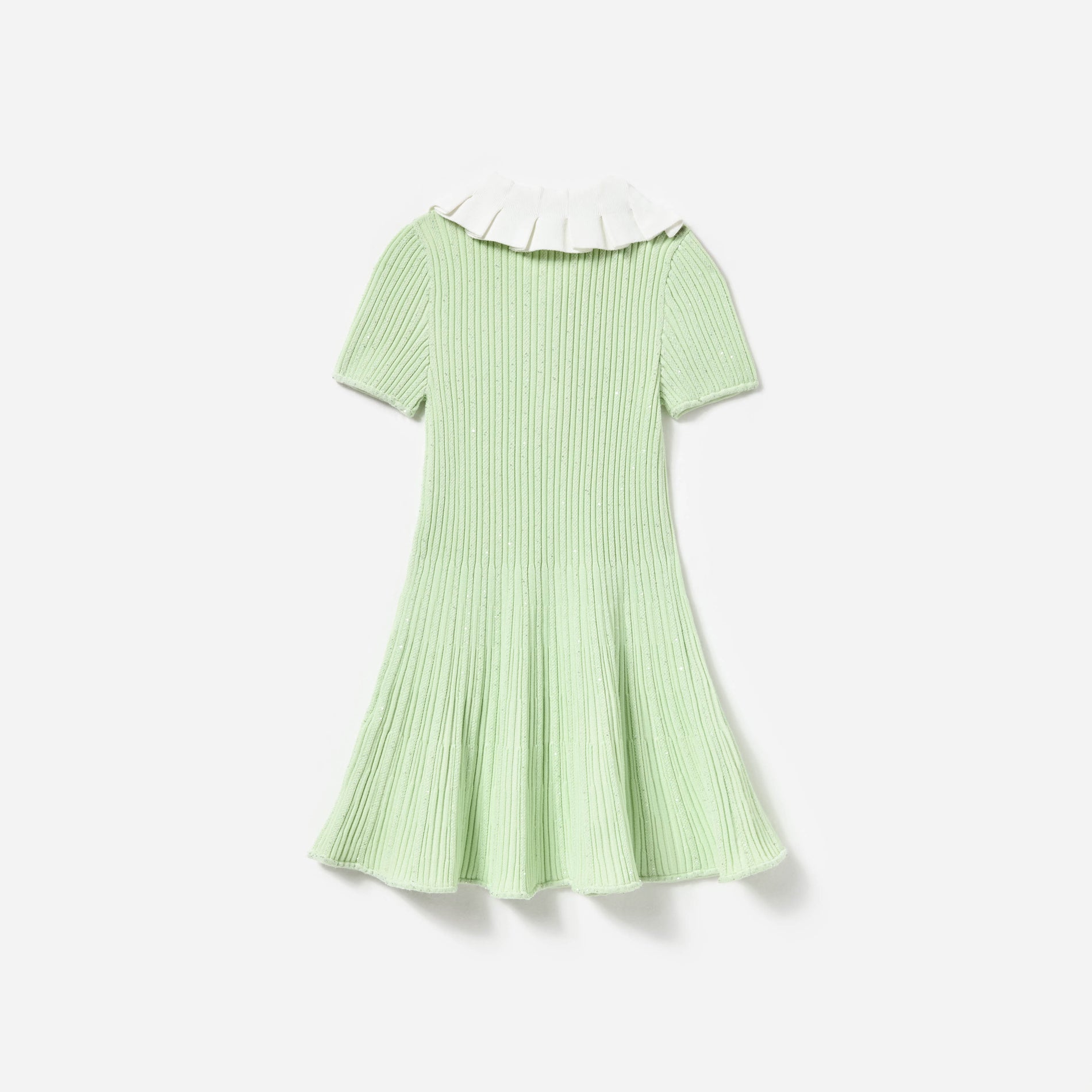 Side view of a woman wearing the Green Ribbed Knit Dress