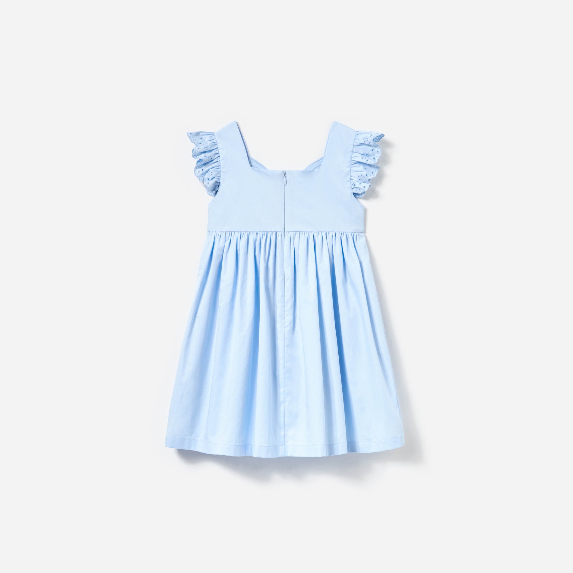 Side view of a woman wearing the Blue Cotton Butterfly Dress