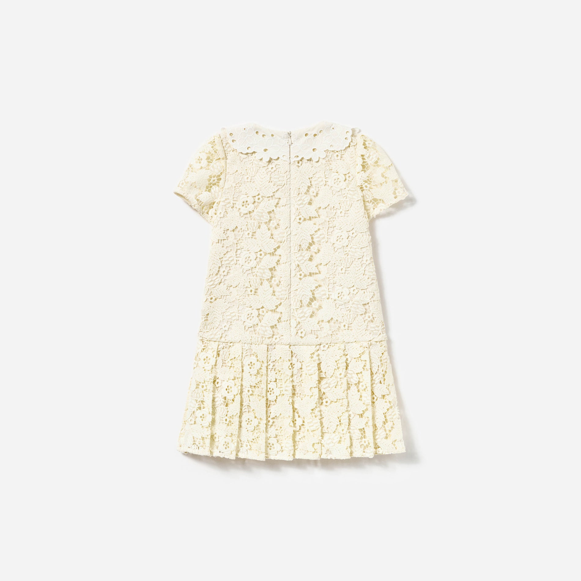 Side view of a woman wearing the Cream Butterfly Lace Dress