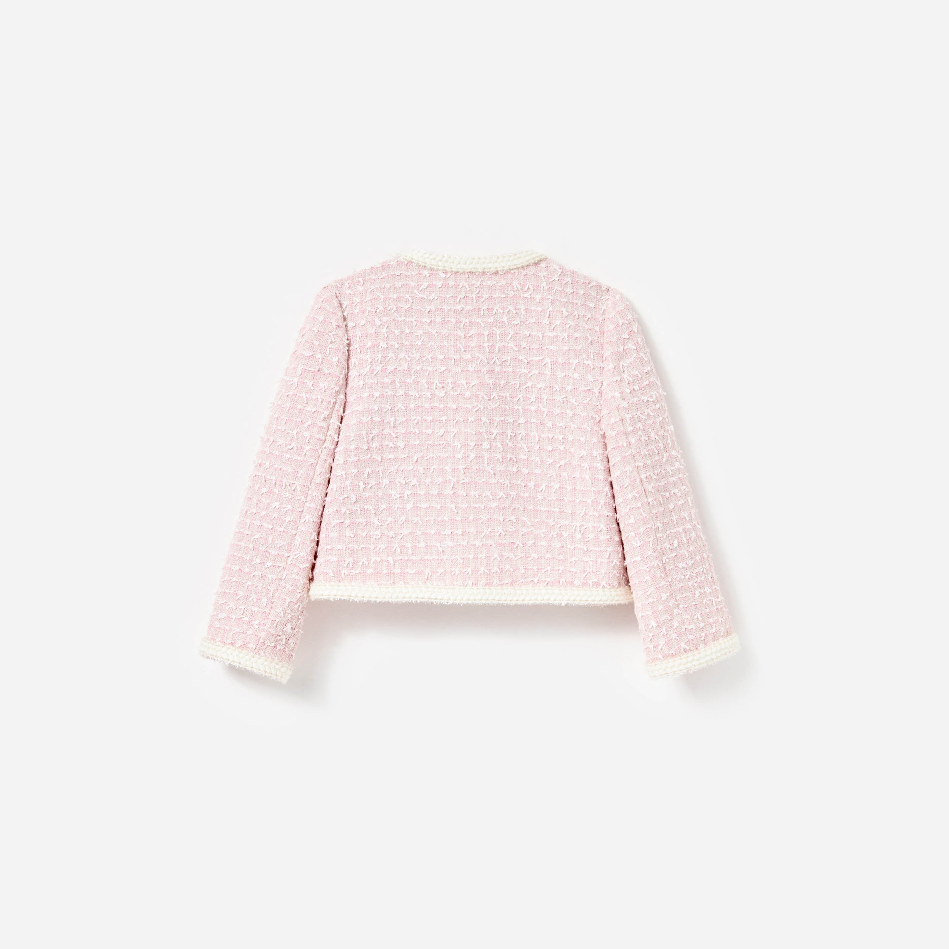 Side view of a woman wearing the Pink Bow Boucle Jacket