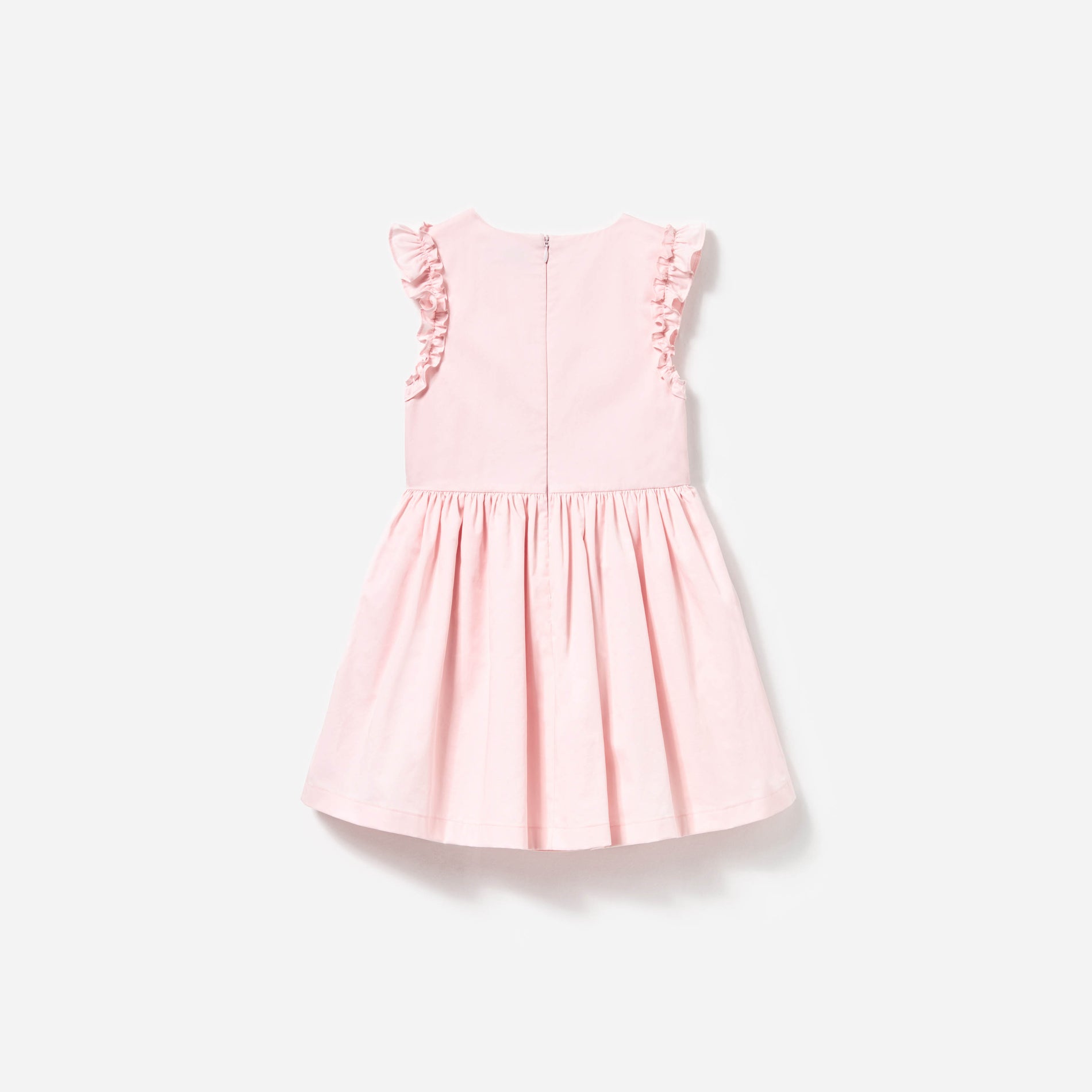 Side view of a woman wearing the Pink Cotton Flower Dress