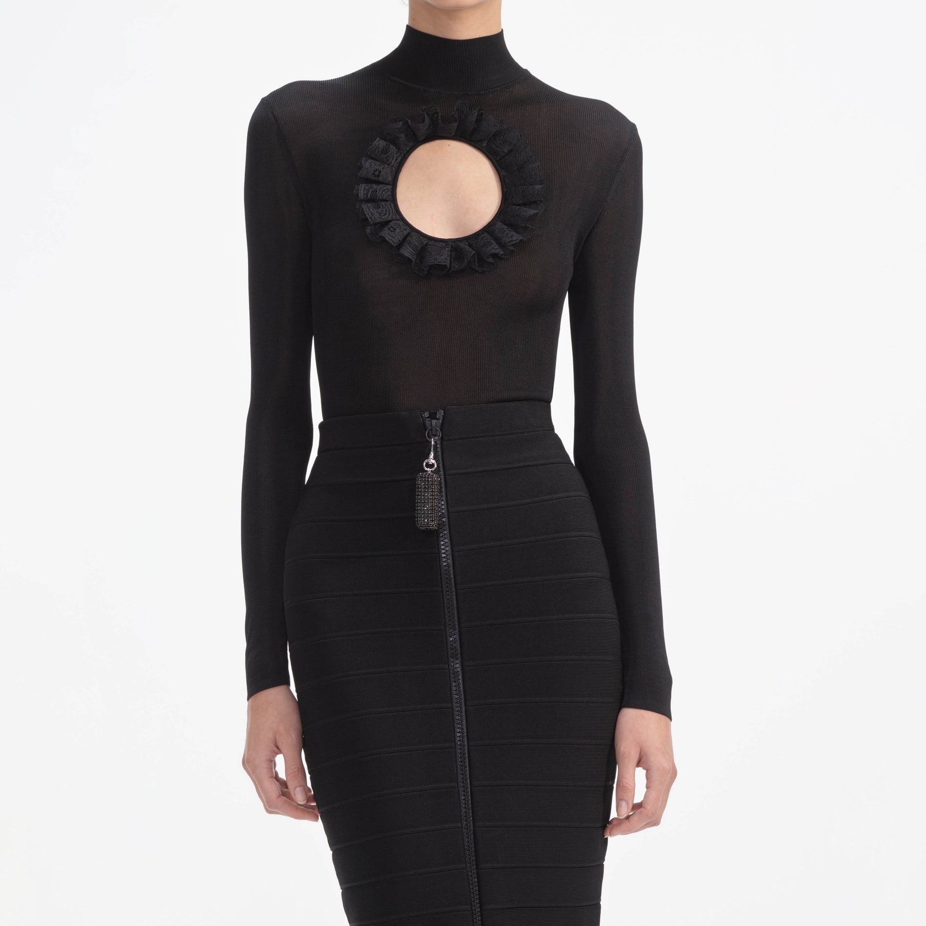 A close up of a woman wearing the Black Ruffle Knit Midi Skirt