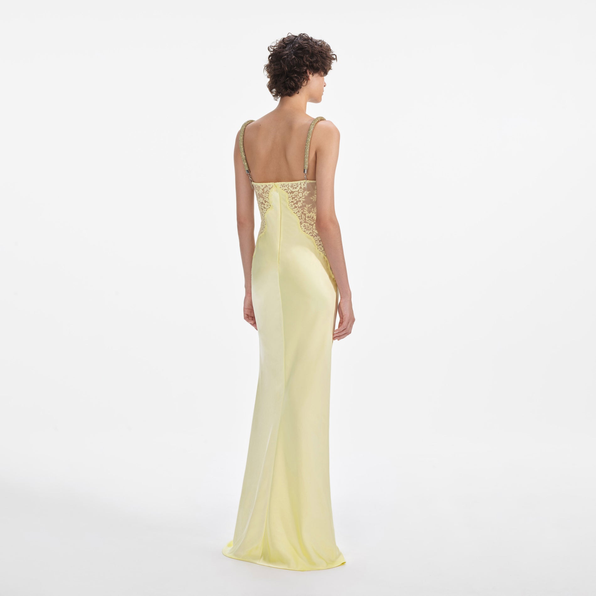 Back view of a woman wearing the Yellow Lace Satin Maxi Dress