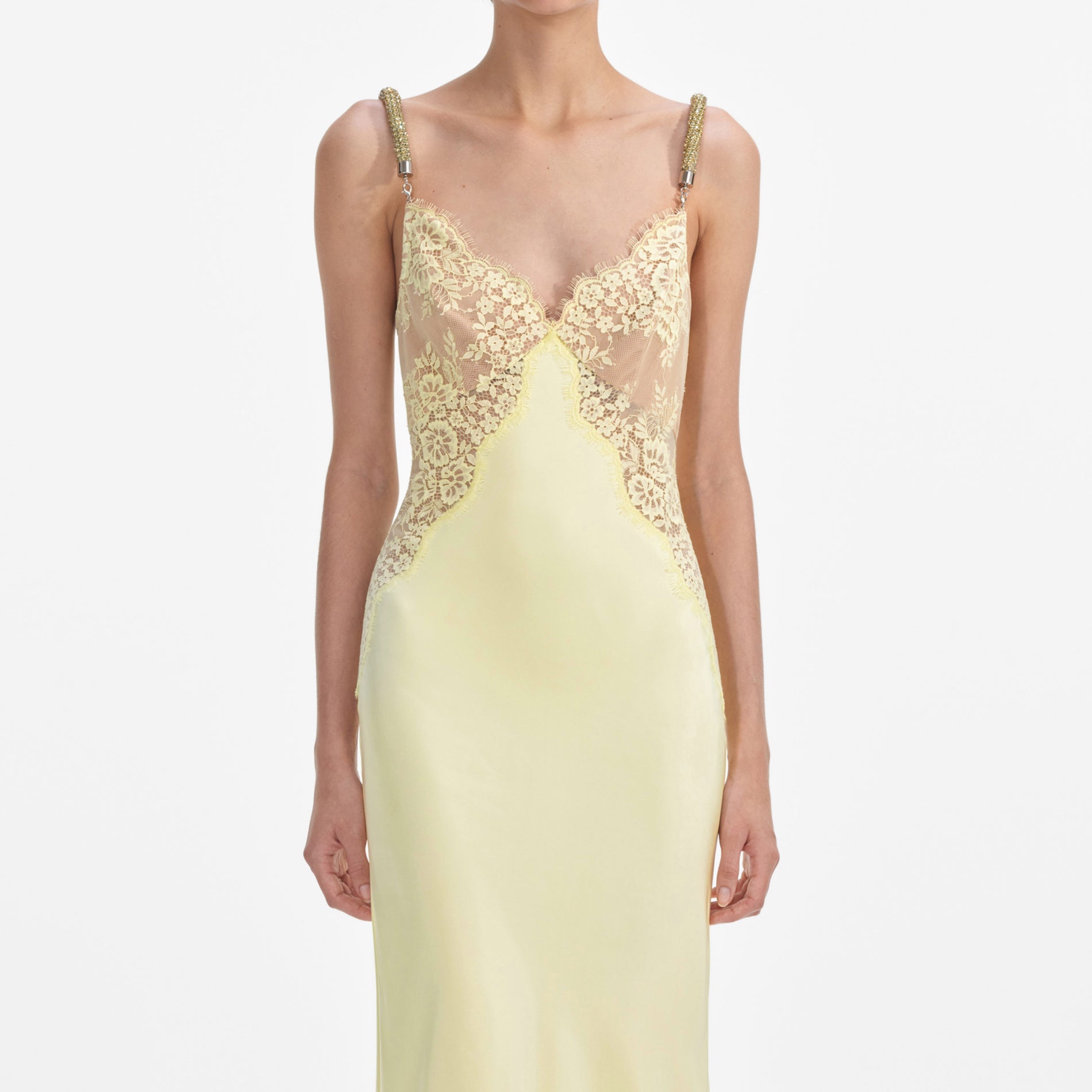 A close up of a woman wearing the Yellow Lace Satin Maxi Dress