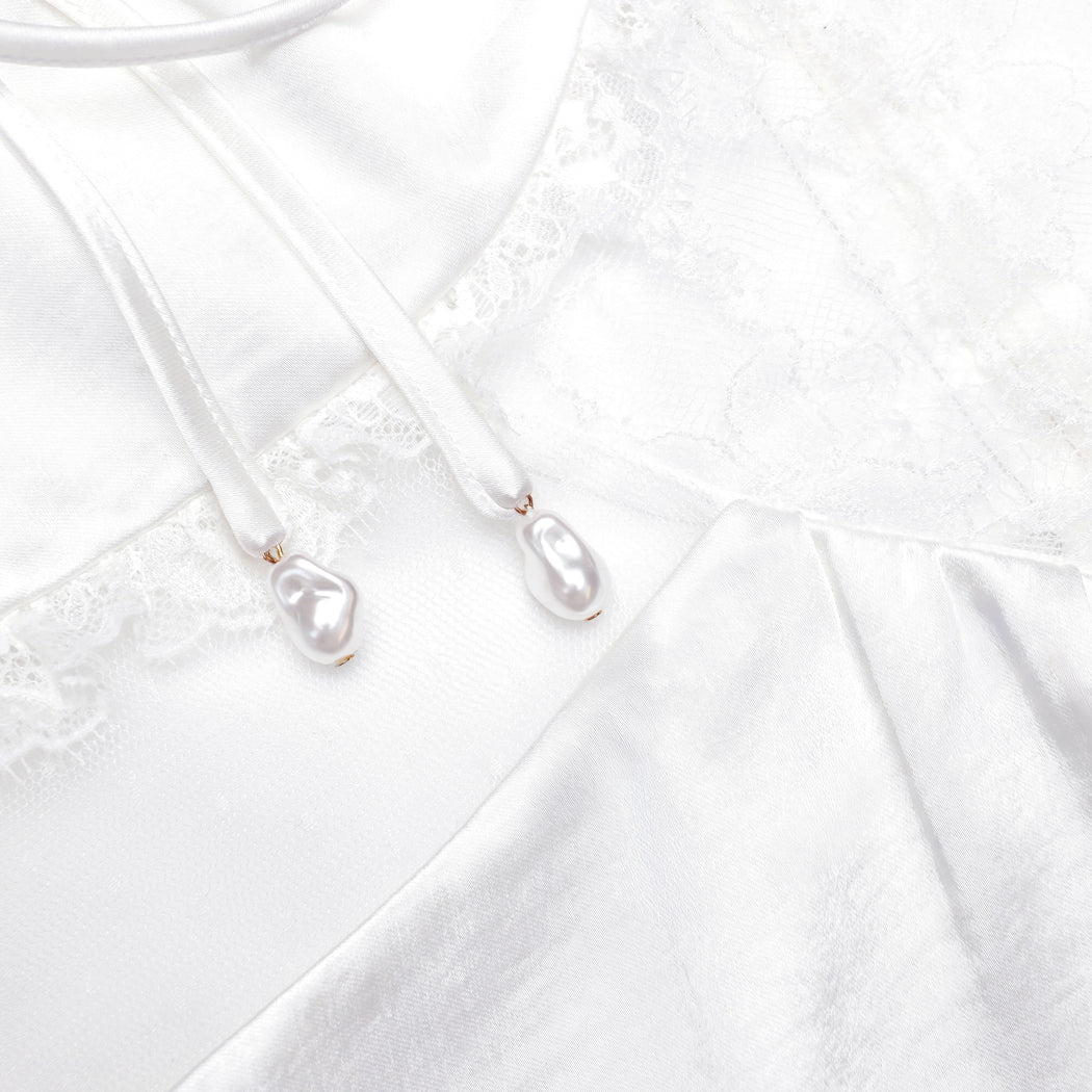 A close up of the fabric for the White Satin Lace Top