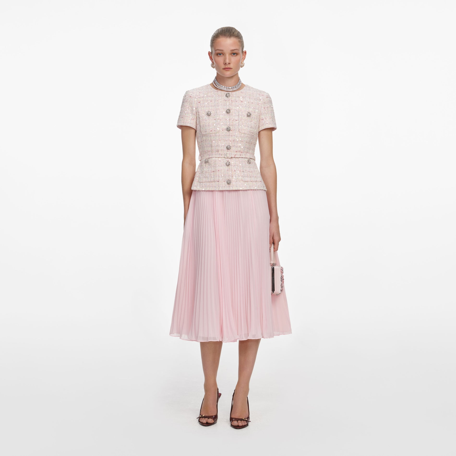 Front view of a woman wearing the Pink Sequin Boucle Tailored Midi Dress