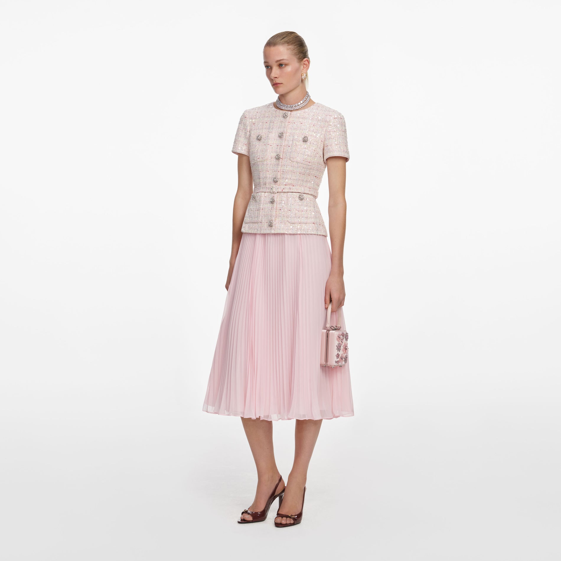 Side view of a woman wearing the Pink Sequin Boucle Tailored Midi Dress