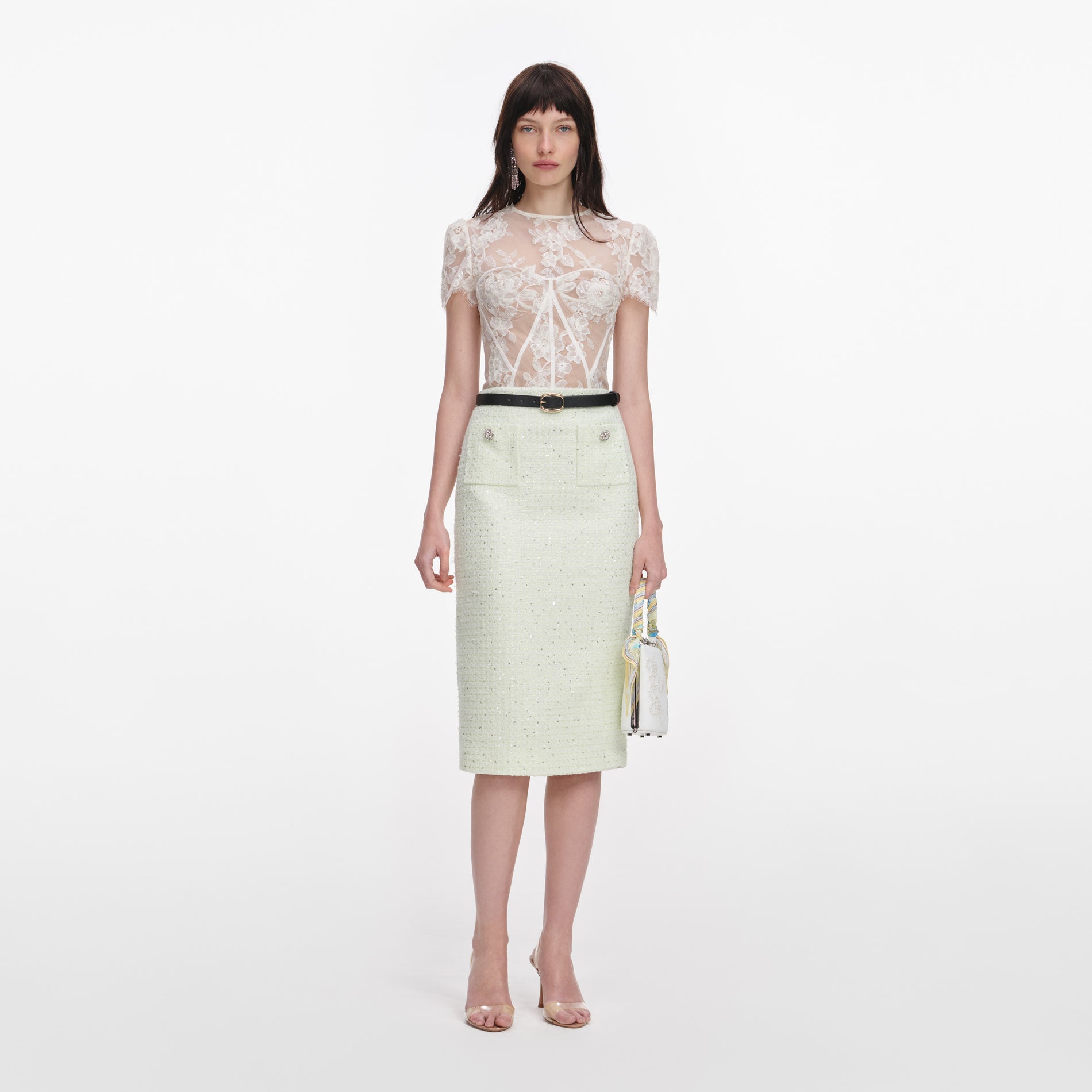 Front view of a woman wearing the White Sequin Lace Top