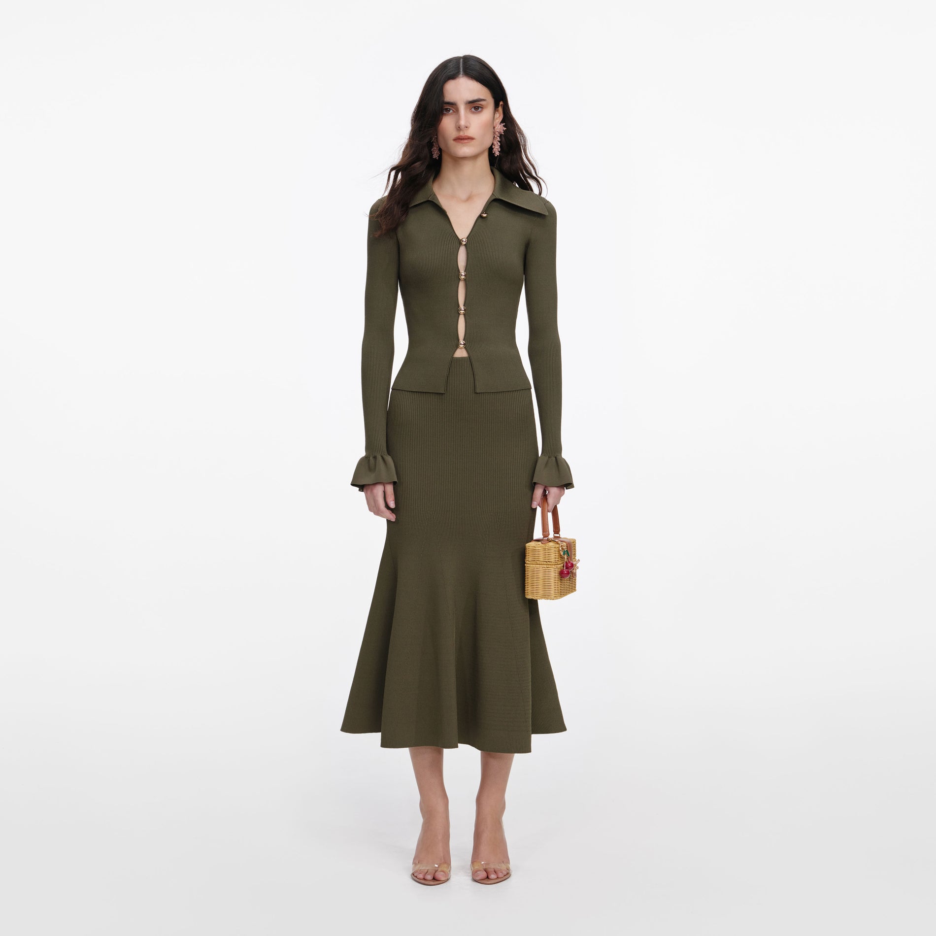 Front view of a woman wearing the Khaki Knit Midi Skirt