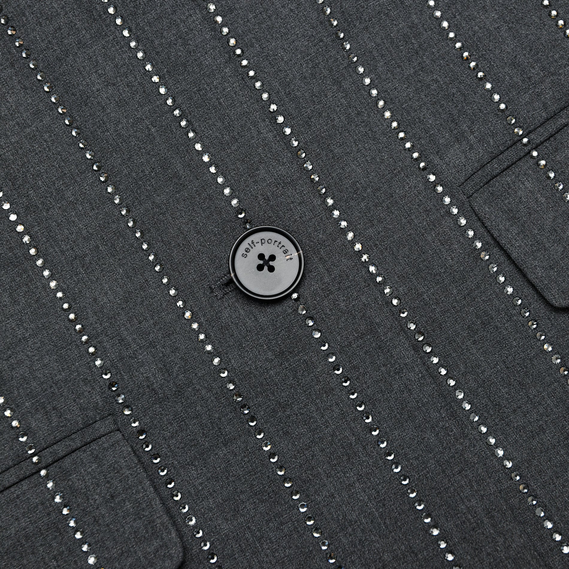 A close up of the fabric for the Grey Rhinestone Pinstripe Blazer